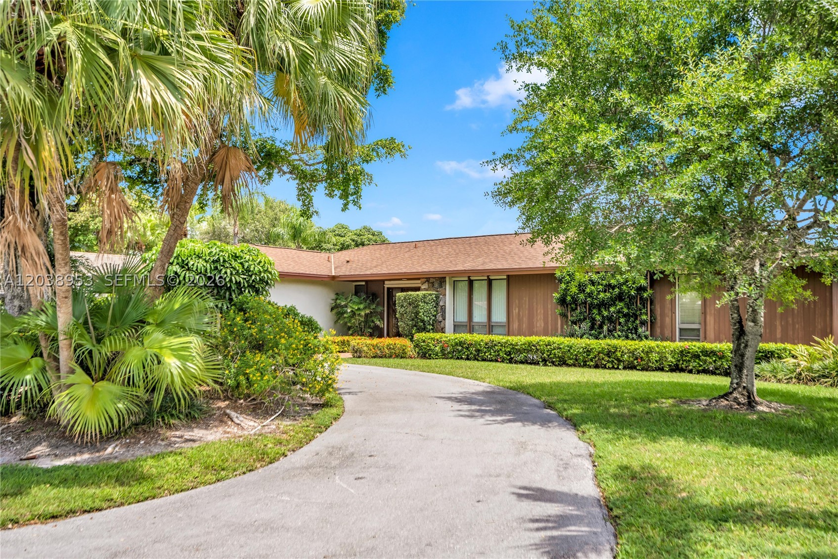First time ever to market!  This effortlessly cool East Kendall home was built in 1978 by the Seller and lovingly maintained and smartly updated along the way. The moment one enters this special home, there a sense of zen and serenity that pervades throughout. The 2600+ square feet of living space is well-configured with three bedrooms in the west wing and a spacious primary bedroom suite which makes up the east wing. The updated kitchen blends both contemporary and vintage design elements and connects seamlessly with the formal dining area and living room. All bathrooms in the home have been fully updated with a designer's touch. The family room and kitchen area communicate organically  with the outdoor covered patio through a series of French doors. The screen-enclosed pool area and patio sets the scene for friends and family to properly enjoy tropical outdoor living. Additional features include a one-car garage, laundry room, charming interior courtyards, unique tile-flooring materials, and a large 15,000+ square foot lot which is elevated and situated well-outside  flood zones. The neighborhood is highly desirable and located within excellent school-zones. 

This is truly a special and soulful home that is ready for its lucky new steward.