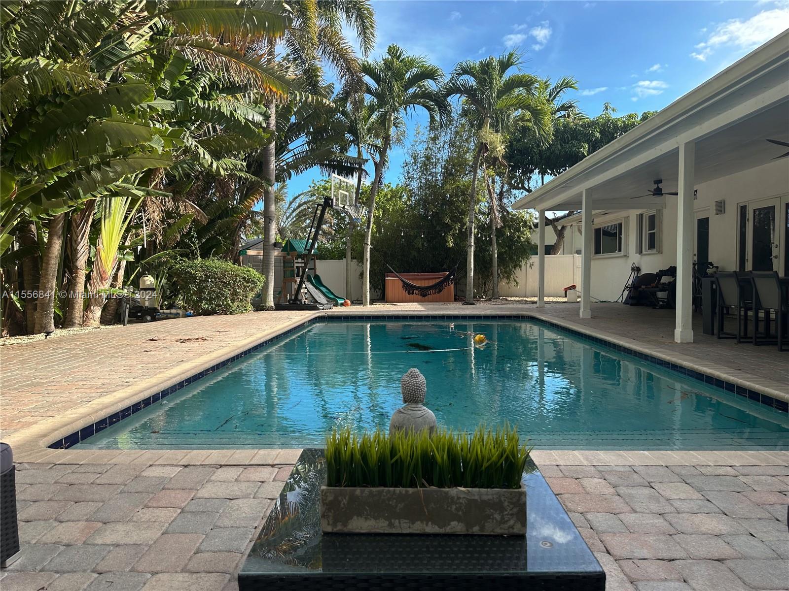 ASK FOR VIDEO - AVAILABLE TO MOVE IN JULY 1ST - Beautifully remodeled 3/2 + studio home in the highly sought-after highland lakes neighborhood. As you enter through the stunning mahogany front door, you are greeted by a spacious open floor plan overlooking the lush, tropical landscaping surrounding the pool. 
Enjoy a relaxing dip in the hot tub or entertain friends and family in the brand new outdoor kitchen equipped with top-of-the-line built-in bbq. The chef's dream kitchen features new appliances, new a/c, and a hot water heater. Additional features include a storage shed, pavers, and proximity to highland lakes park, aventura mall, airports, and the beach. nearby are houses of worship and top-rated schools within walking distance.
EASY TO SHOW - ASK FOR VIDEO