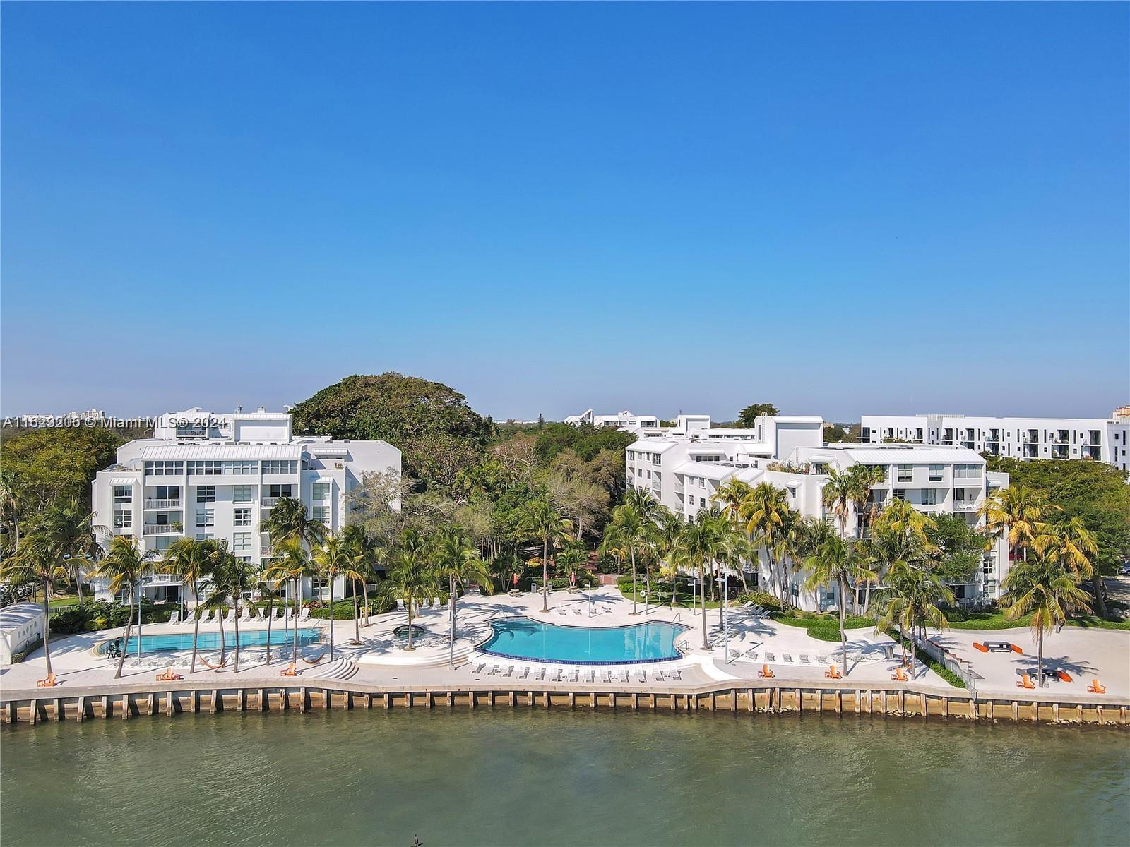 Welcome to Nirvana Miami's hidden gem located in the Upper Eastside/MIMO neighborhood. This desirable, very well maintained 2/2 offers garden, bay and pool views!  Resort style community situated on Beautiful Biscayne Bay has 2 pools (infinity & lap), jacuzzi, beach area for launching your paddleboard/Kayak, volleyball court, modern gym, 24-hour guard-gated security and plenty of visitor parking. Nestled between gorgeous Morningside and Legion Parks where you can walk to the Saturday’s Farmers Market. Explore tiny nearby islands on your paddle board along the bay. Pet friendly community near many restaurants, Design District, Midtown, Buena Vista and Wynwood. Short drive to Brickell, beaches, port of Miami and Miami Int’l airport. So much to appreciate in this nature filled urban oasis!