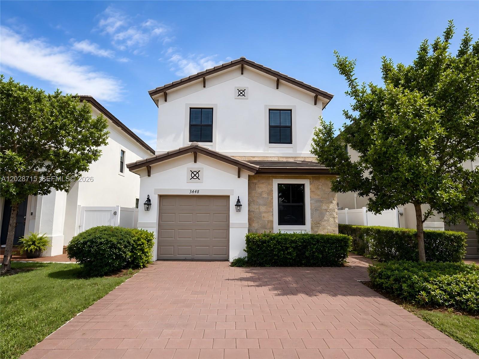 This turnkey two-story single-family house features 4 bedrooms and 3 full bathrooms, including a convenient first-floor bedroom and a full bath, ideal for guests and muti-generational living. Located in the gated community, the residents enjoy the access to two luxurious clubhouses with one conveniently situated directly across the house. The house show cases new vinyl flooring from the staircase throughout the second floor, open concept living area, new lighting fixtures, modern open kitchen, perfect for everyday living and entertaining.