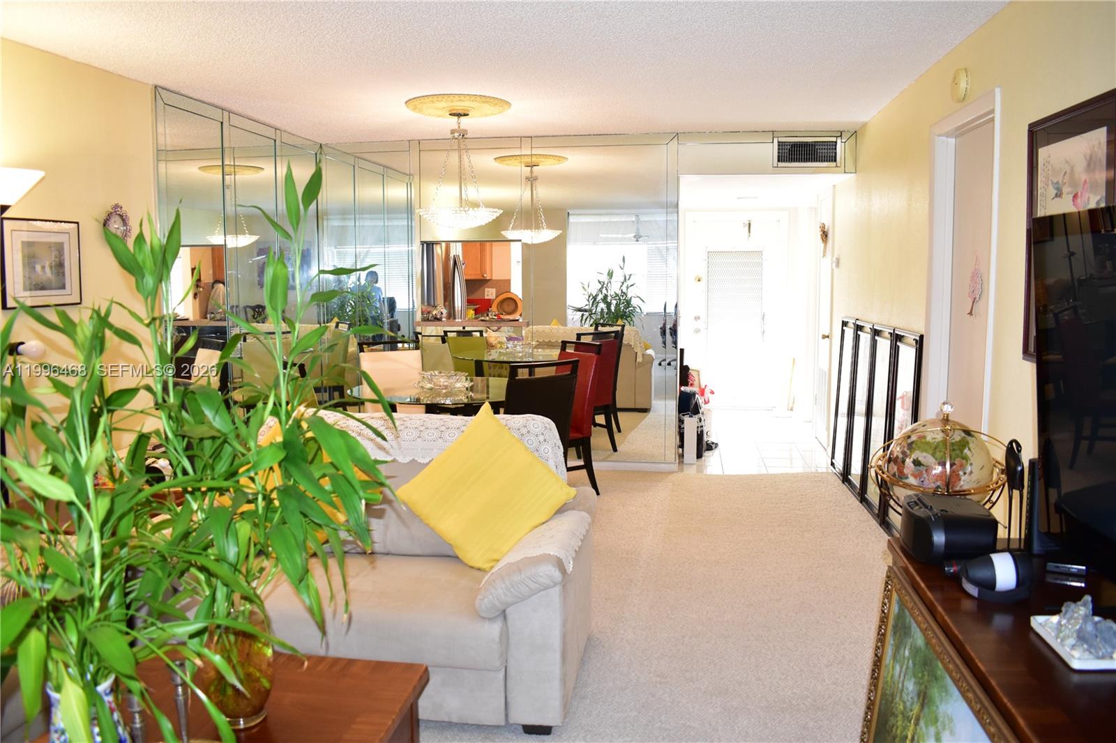 This is an updated partially furnished condo near Nob Hill Road.  It is the deluxe version of the 1 bedroom, 1 1/2 bath unit which actually has more air conditioned living space than the regular 2/2!  The Florida room in the back accommodates a large bed and is often furnished with a Murphy bed for guests.  The kitchen and bathrooms have been updated and the unit is easy to live in as is, without having any projects to take care of.  Sunrise Lakes Phase 3 is a golf community located about 30 minutes from the beach in Ft Lauderdale and with easy access to plenty of restaurants, shopping and other activities.  Easy to show.  Enjoy a life of inclusivity and leisure in Sunrise.  Maintenance includes water, sewer, cable, WIFI, and monthly pest control.  10 swimming pools, tennis and pickleball courts as well as weekly dances, shows, bingo, movies and more round out the activities offered as part of living in this community.  Come see for yourself!
