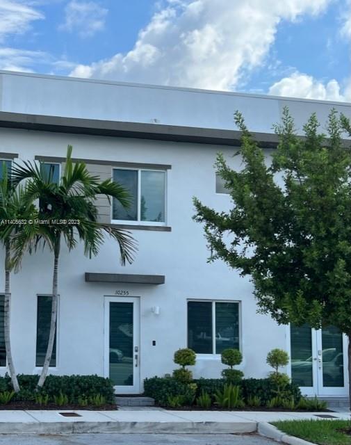 Spacious unit with garage at Landmark at Doral. This 3 bedroom 2.5 bathroom townhouse has an open area with kitchen, living and dining perfect for entertaining. The modern kitchen features a deluxe stainless steel appliance package and quartz countertop. Walk in closets and master bathroom with dual sink and large shower are very spacious. The home is equipped with the most up to date technology, Wi-Fi ready and keyless entry. The community offers resort style amenities, with tennis courts, pool, and gym. Various schools as well as parks in the area.