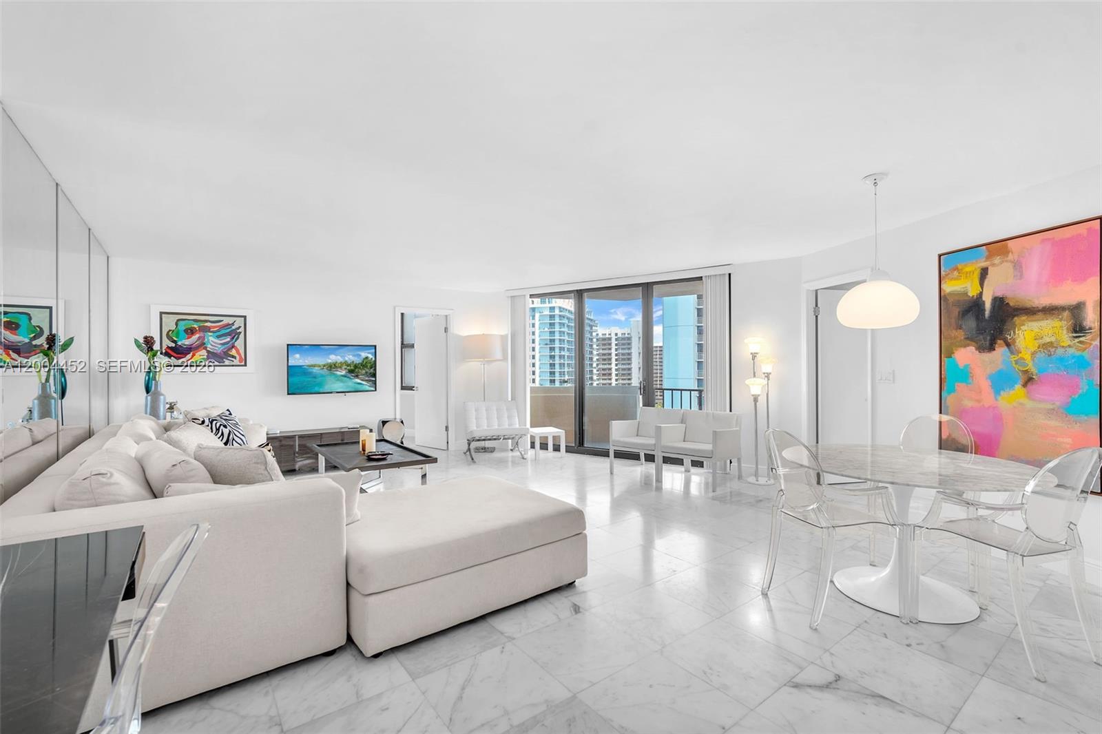 Welcome to paradise at Singer Island—where luxury living meets breathtaking coastal beauty! This fully renovated and furnished 15th-floor residence in Phoenix Tower B offers spectacular northeast and northwest views of both the Atlantic Ocean and Intracoastal Waterway, delivering unforgettable sunsets and a true resort-style experience. This sophisticated 2-bedroom, 2-bath split floor plan showcases premium finishes and impeccable design throughout. The unit features elegant marble flooring, a beautifully updated kitchen with stainless steel appliances, and fully remodeled bathrooms adorned with floor-to-ceiling marble—offering both a walk-in shower and a tub/shower combination. Floor-to-ceiling window treatments in the bedrooms enhance both style and comfort, while abundant storage includes two walk-in closets and a linen closet. Dual-zone A/C, and a turnkey, move-in-ready presentation tailored for the most discerning buyer. Enjoy the convenience of a washer and dryer on each floor, along with covered parking and a private storage bin. Residents benefit from a gated community offering exceptional amenities, including direct beach access with chairs and umbrellas, a pool, fitness center, tennis and pickleball courts, shuffleboard, BBQ grills, and more. Ideally located near the Ocean Mall. Don’t miss your chance to own a piece of paradise at an incredible value! This property also allows immediate rentals up to four times per year.