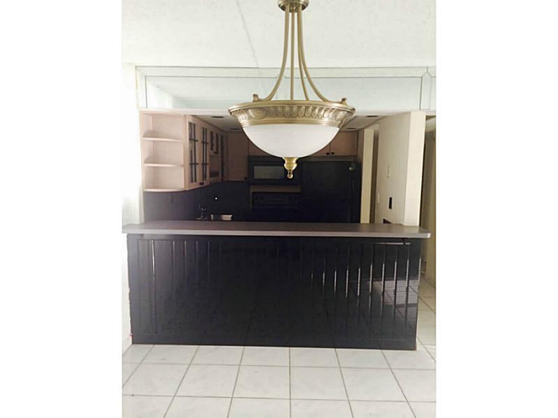 All ages welcome to the Hampton Court Community with pool. A large cozy and spacious 2 Bedroom, 2 Bathroom. Nice porch with updated tile throughout. First, last and security required. Text Listing Agent for Lock Box Information.