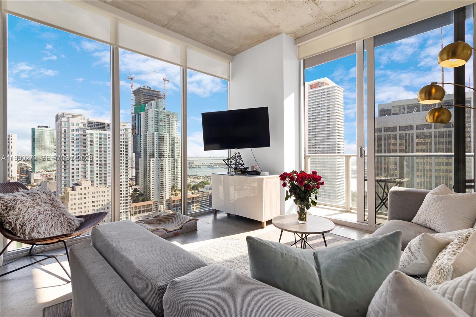 Enjoy incredible water & city views from this 1 Bedroom in Downtown Miami's modern Centro Condo! Fully Furnished & with Tenant in place (Jan 2027 $3100/month) this is the perfect investment opportunity! Building allows monthly rentals. Walking distance to Kaseya Center, Bayside, Bayfront park and Brickell! Or walk 2 blocks to the station that takes you around Downtown Miami or Brickell. Prime location! Rooftop pool, Gym, 24 hour front desk & so much more!