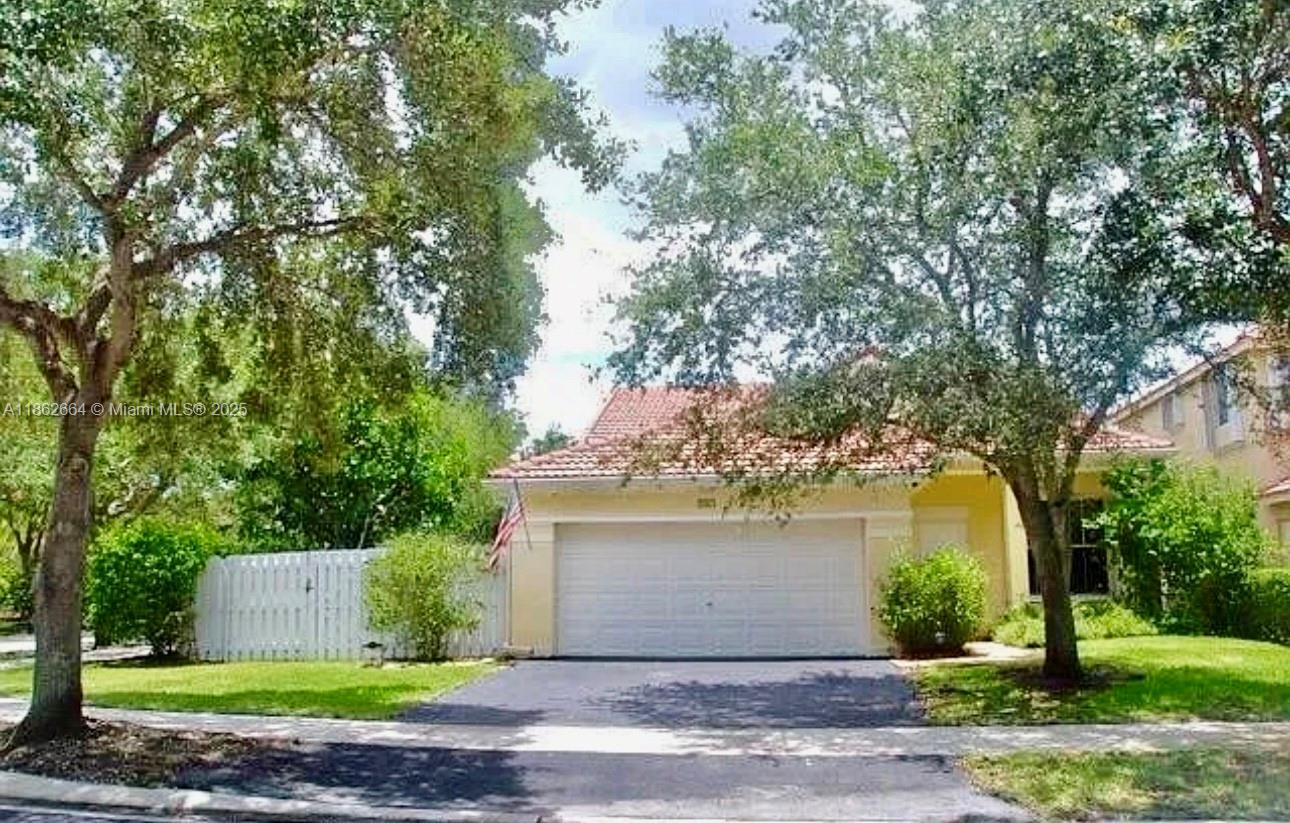 Fully Remodeled Home located in The Falls Community in Weston! Beautiful 3-bedroom, 2-bathroom, Single-Family Home. 
Step inside to find an open and bright floor plan featuring brand new Timberlane Oak plank flooring, Master Bathroom features Stand Alone Tub, Marble Floors and Viviano Marmo Mosaic Floors. Newly installed window treatments and and blackout shades throughout. Freshly painted!