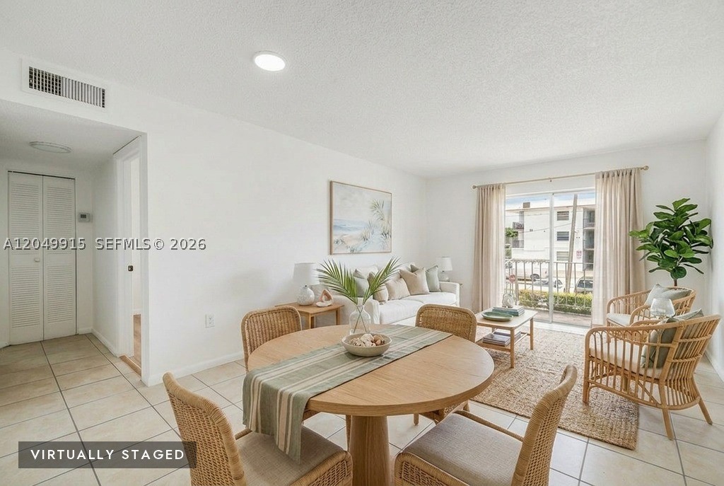 Move in ready 1 bedroom, 1 bathroom condo located on the second floor with elevator access and one assigned parking space. Bright and well maintained interior featuring a functional layout, spacious living area, and private balcony. Excellent opportunity for both homeowners and investors, as rentals are permitted. Low HOA of just $245/month. Conveniently located near shopping, dining, major highways, and public transportation. Estimated rental potential of approximately $1,600/month. A great value with immediate occupancy available.