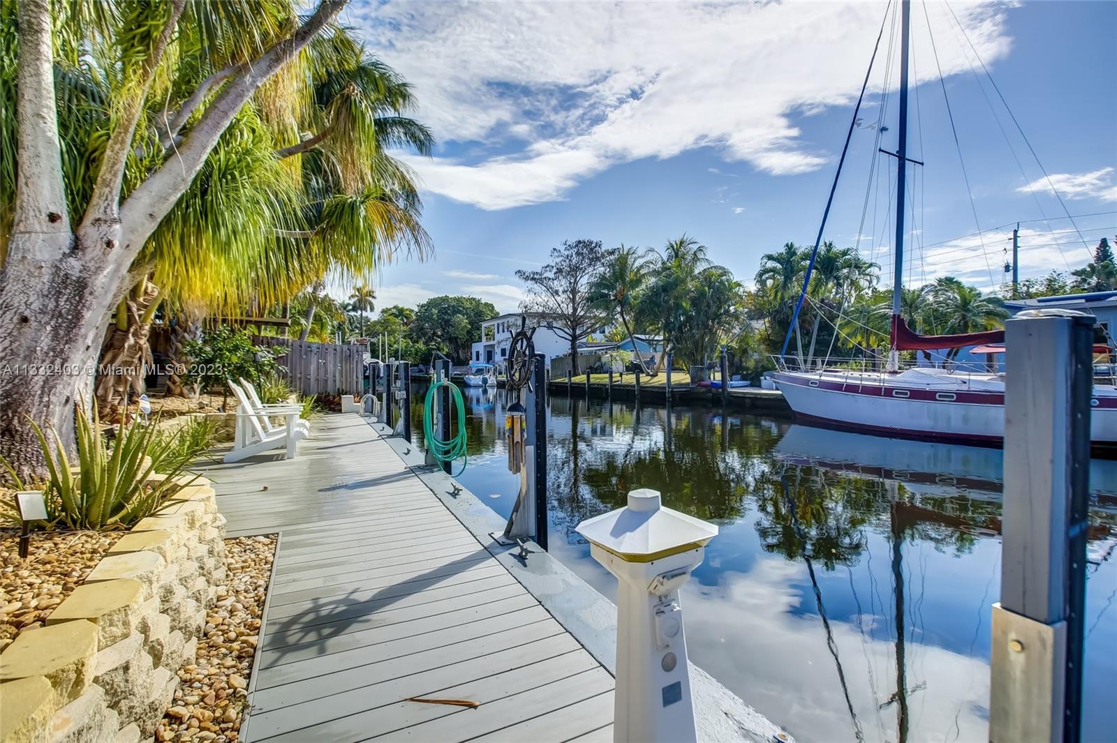 Welcome to Gill Isles and your BRAND NEW  backyard with Heated Saltwater Pool & Jacuzzi & Travertine Patio with  misting system. On 65 ft of deep water with direct ocean access & NO FIXED BRIDGES for your sailboat, 65 ft Composite Dock installed in 2016 w/25 yr warranty.  Great for entertaining, Impact Glass Sliding Doors,  Roof 2012, AC 2013. All Tile throughout, Carport for your car. Just a 15 min boat ride to downtown Ft Lauderdale & 40 min boat ride to ocean.   Great area for AIRBNB, close to I-95 & everything Ft Lauderdale has to offer.  Compare to 1600 SW 5th Ct that closed for $1.4m.   Financed offers welcome.  Quick or long closing ok, Seller can vacate at closing.   NO HOA or restrictions. Property is Not in a flood zone.  Seawall inspection done.  Great Elevation.