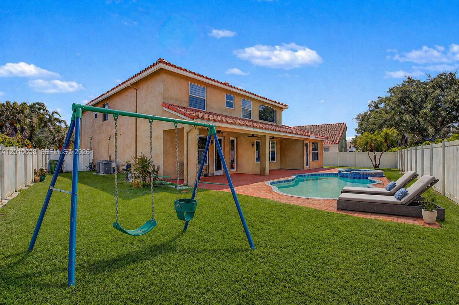 Beautifully updated 6-bedroom pool home with a rare double primary suite layout in one of West Pembroke Pines’ most desirable gated communities. This spacious home offers over 3,500 square feet with a first-floor primary suite, soaring living areas, versatile loft, and room for multigenerational living, guests, or a home office setup. Major recent upgrades include a-new 2022 roof, 2 new energy efficient A/C units, impact windows and doors, water softner, updated flooring, and modern quartz kitchen with oversized island and walk-in pantry. The private backyard features a pool and covered patio ideal for entertaining and South Florida outdoor living. Located near top-rated schools, parks, shopping, and commuter routes, this home combines space, functionality, and peace of mind with big-ticket upgrades already completed. True move in ready Gem Must See!