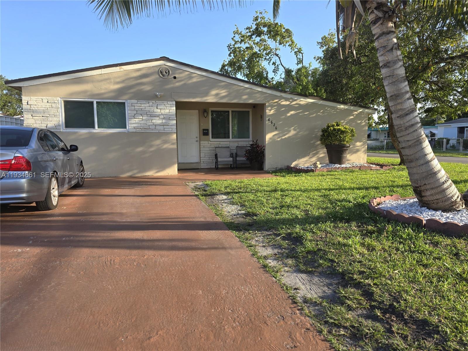 Fantastic Opportunity to Own This Versatile 3BR/2BA Home!
This spacious residence features a beautifully updated kitchen with stainless steel appliances and granite countertops, along with updated bathrooms. Additional highlights include high-impact windows, a 2019 roof (under warranty), an upgraded electrical panel, and a charming backyard pergola—perfect for entertaining.

The flexible floor plan includes a family room that may be used as a private efficiency or mother-in-law suite, complete with its own bathroom and separate entrance. Ideal for multi-generational living or income potential (buyer to verify use and zoning).

Located in a great neighborhood close to shopping, schools, and major highways, including the Turnpike, I-95, and I-595. No HOA!