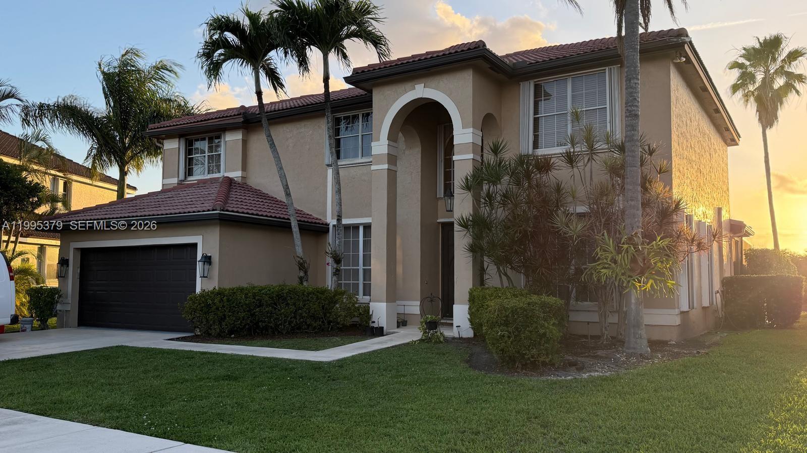 Welcome to your dream home in the heart of Miramar! This beautiful 4 bedroom, 2.5 bath residence features a spacious additional room downstairs- perfect for a home office, playroom, or guest room. Step outside to your private backyard oasis with a stunning pool overlooking a serene lake ideal for relaxing or entertaining guest. Located in a desirable gated community and centrally located with easy access to I-75, this home offers both luxury and convenience. With upgrades throughout and breathtaking water views, this is a home you don't want to miss!
