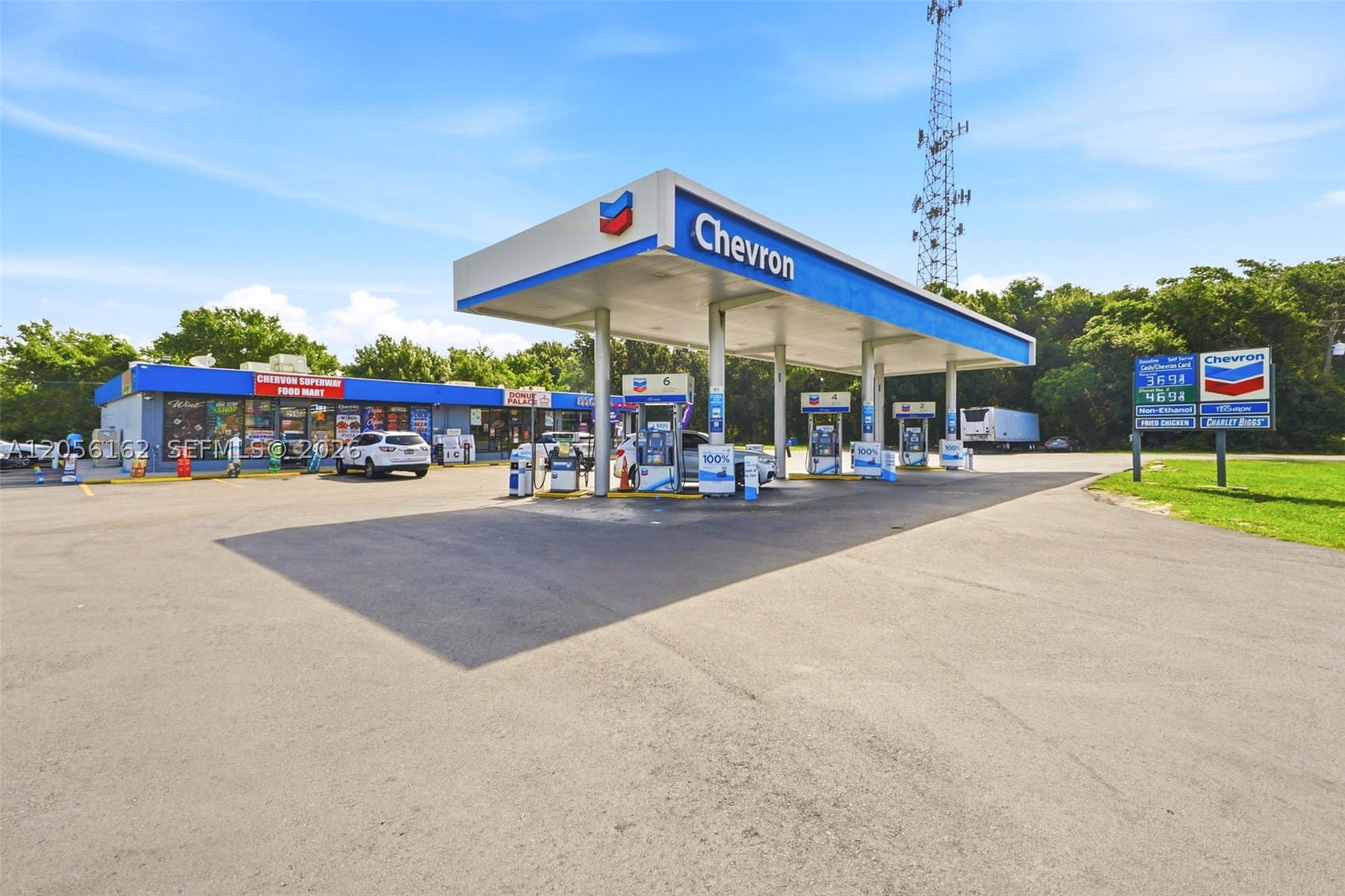 Fausto Commercial is pleased to exclusively present 2590 Recker Highway, a rare opportunity to acquire a Chevron-branded gas station and convenience store situated on a 59,585 SF (1.37± acre) parcel in the heart of Winter Haven, Florida. Positioned along Recker Highway (CR 540), one of Polk County's primary commercial corridors, the property benefits from approximately 25,000 vehicles per day, providing exceptional visibility and consistent customer traffic. The property features a 6,720 SF convenience store, three fuel pumps with six fueling positions, and multiple supplemental income streams generated by established retail tenants, creating diversified and stable cash flow. The existing Chevron fuel supply agreement expires in less than three years, presenting a significant value-add opportunity for a new owner to negotiate more favorable fuel terms, rebrand the station, or operate independently.
Strategically located within one of Florida's fastest-growing counties, the property is surrounded by expanding residential communities, established retail, healthcare providers, and major employment centers that continue to drive long-term demand for fuel and convenience retail. The site is zoned CAC (County Activity Center), allowing a broad range of commercial uses and providing future redevelopment flexibility.