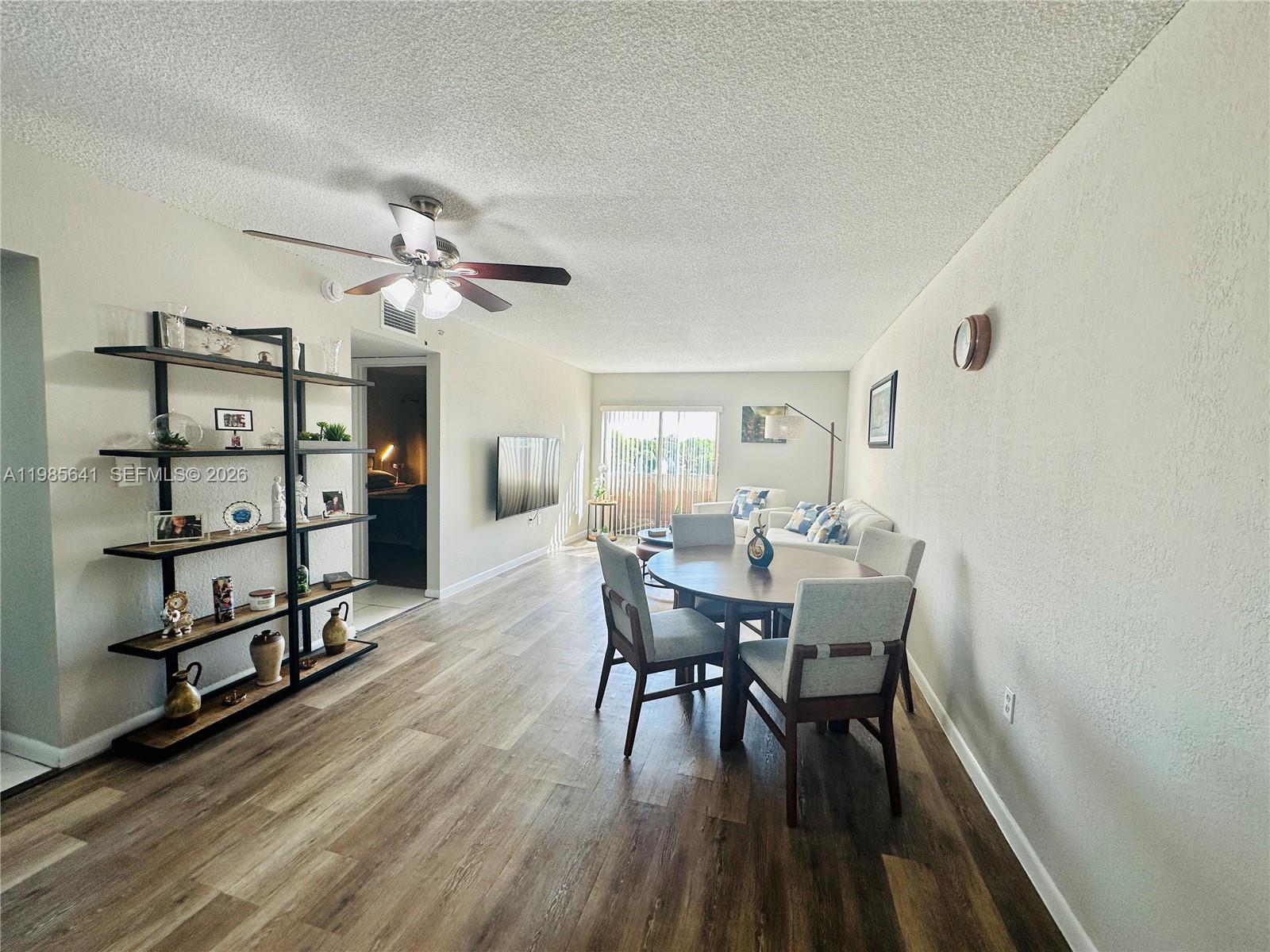 Spacious apartment in a prime location! Balconies are currently being remodeled, so not visible in the photo—they stretch from living room to bedroom. The seller will pay assessments. Natural light, functional layout, close to highways, shops, and schools. Great for living or investing. Schedule your showing today!