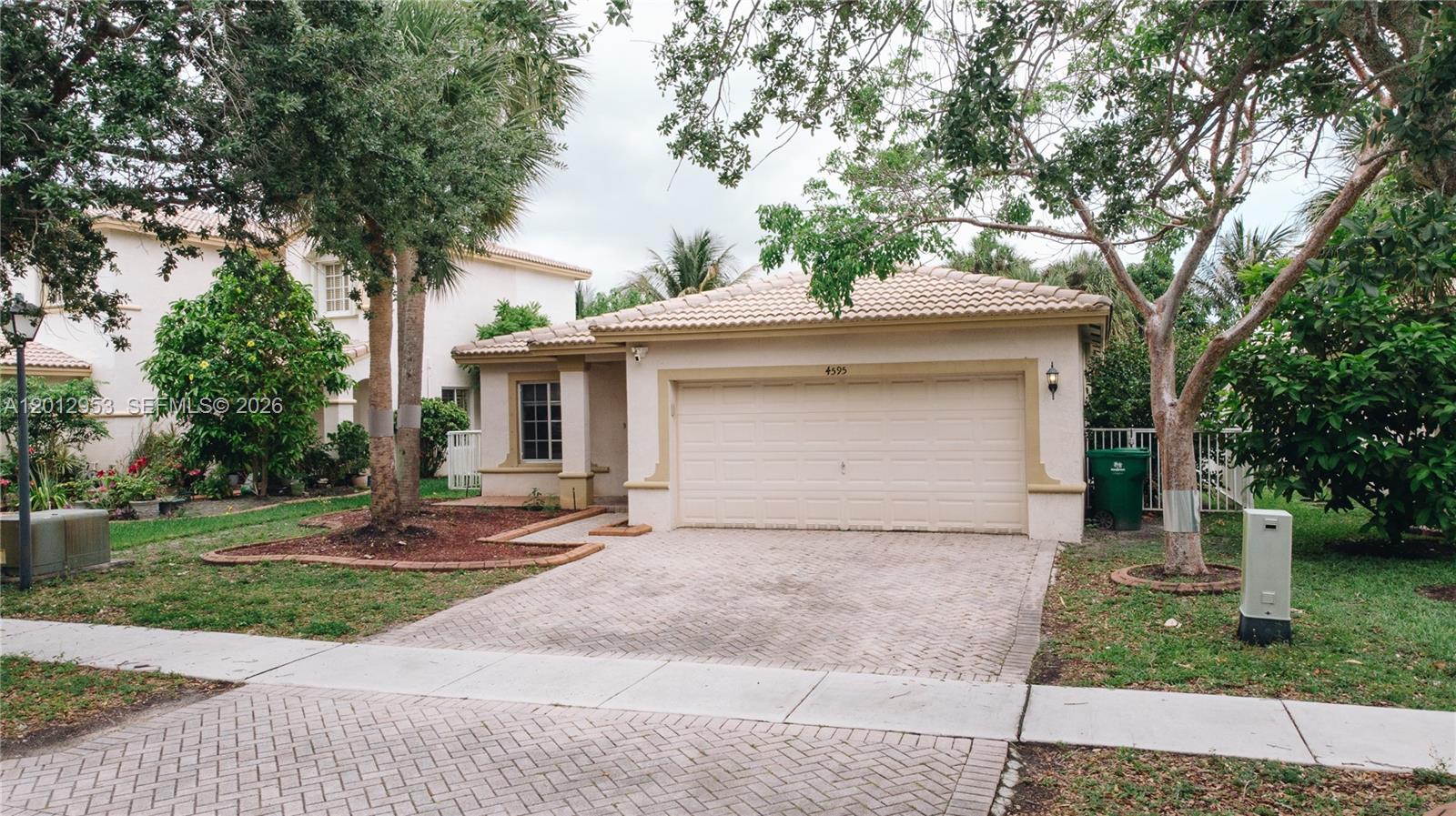Beautiful 3-bedroom, 2-bathroom home with a spacious 2-car garage, ideally situated on a serene lake in the highly desirable Silver Falls community. This guard-gated neighborhood offers security, charm, and a low HOA, making it perfect for comfortable living. Enjoy peaceful water views and a well-maintained environment throughout. Conveniently located near major shopping centers, dining, and with easy access to both Miami-Dade and Broward counties. A perfect blend of location, lifestyle, and value!