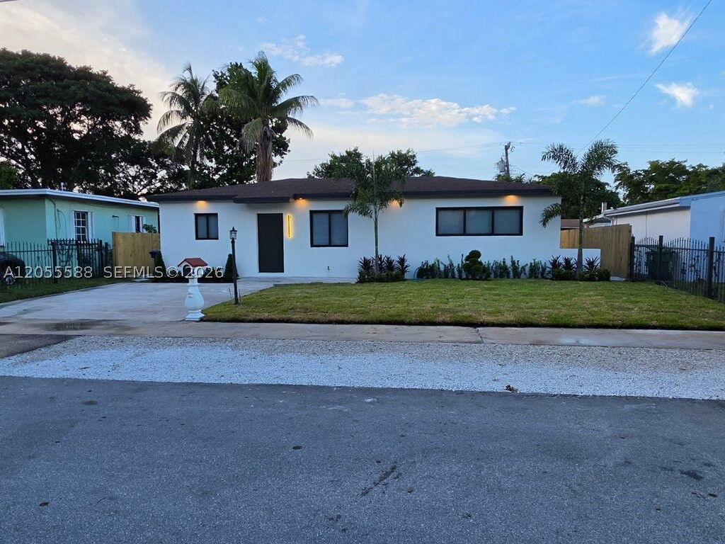 LOCATION!!! LOCATION!!!! LOCATION!!!HOME HAS BEEN TOTALLY RENOVATED!!!! This home features three bedroom two baths has been totally renovated with new kitchen, new tile floors. new bathroom, new interior and exterior paint. New hurricane impact windows. Everything new. separate  in-law quarters. A must see to appreciate all the details.