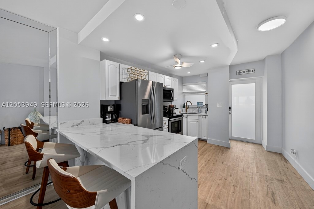 BREAKERS CONDOMINIUM - Residential Lease
