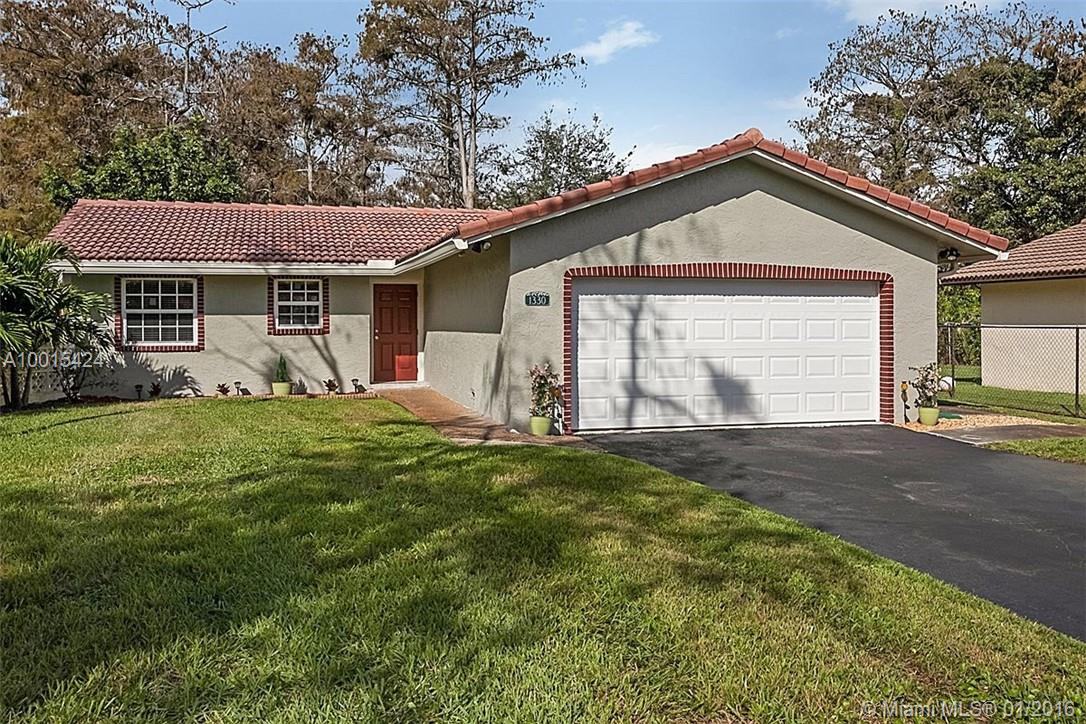 Completely remodeled contemporary 2 bedroom w/office home in CUL-DE-SAC!  Highly efficient & secure! EVERYTHING IS NEW. High impact doors. Beautiful granite kitchen w/breakfast bar & top of the line appliances. Gorgeous porcelain tile floors/w/double Berber in bedrooms. New Trane AC w/air purifier. Recessed lighting. Fenced backyard. Wood window treatments/new electrical system/triple insulated garage door/new hot water heater. Sit back since nothing to repair & enjoy your built in 65" TV! A rare gem!