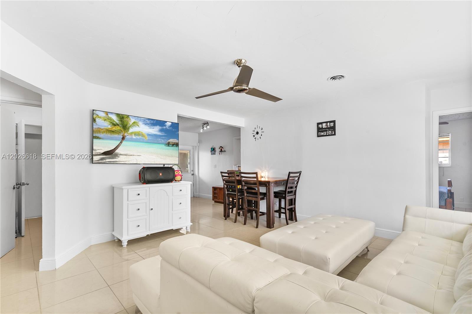 Beautifully updated 4-bedroom, 2-bath single-family home in the heart of Pompano Beach offering a versatile 3-way split floor plan ideal for privacy and flexible living. Two bedrooms feature French doors with direct backyard access, including one with an en-suite bath perfect for guests, extended family, home office, gym, or potential rental flexibility. Bright living spaces are filled with natural light from the large picture window overlooking the front yard.

Step outside to enjoy the oversized fenced backyard with a large in-ground pool, spacious patio area, and covered outdoor space perfect for entertaining or relaxing year-round. Plenty of room for pets, play, or creating your own tropical retreat.

Conveniently located near I-95, the Florida Turnpike, beaches, marinas, parks, shopping, dining, and the vibrant Pompano Beach Fishing Village. NO HOA offers added flexibility and fewer restrictions. Great opportunity for primary residence, multigenerational living, seasonal use, or investment potential.