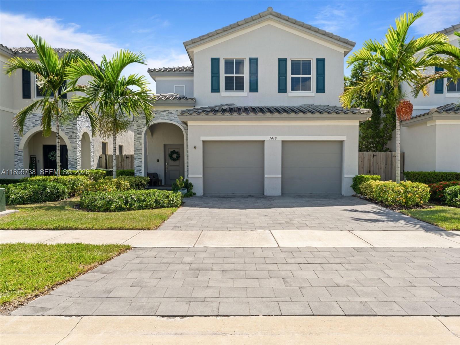 SELLER MUST SELL! DOWN PAYMENT OR CLOSING COSTS ASSISTANCE FOR BUYERS! Welcome to this impressive two-story home in Homestead featuring 5 bedrooms & 3 bathrooms, including a convenient 1 bed/1 bath on the first floor, perfect for guests or anyone needing added privacy & easy accessibility. The bright, open layout connects seamlessly to a modern white kitchen featuring stainless steel appliances, a breakfast bar, and abundant counter space. Upstairs, the expansive primary suite includes a luxurious ensuite with double vanities, a soaking tub, and a walk-in shower. Three additional bedrooms provide flexibility for family, guests, or a home office. The private fenced backyard boasts low-maintenance turf and a spacious patio, ideal for outdoor gatherings. Complete with a two-car garage.