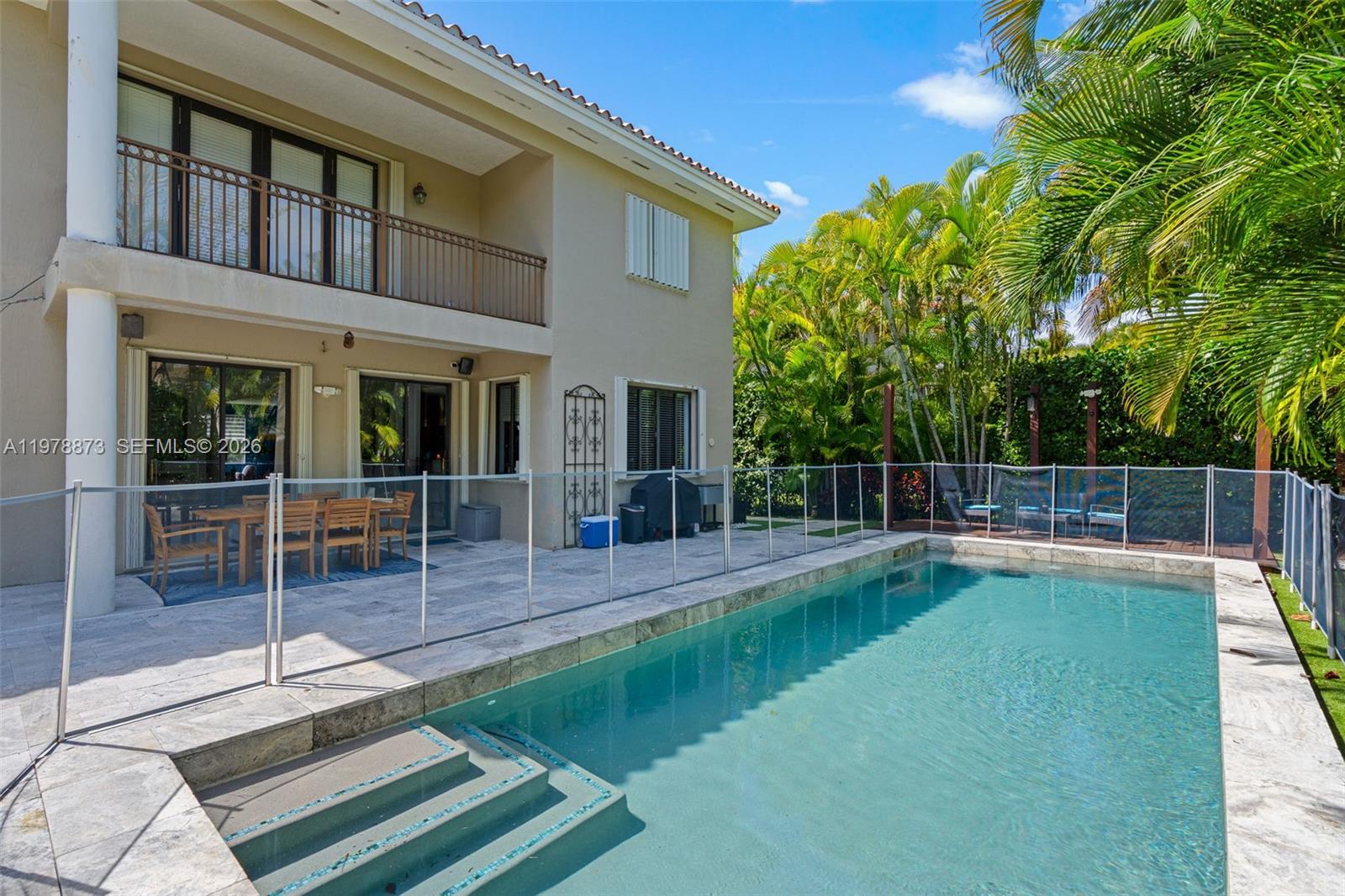 Elegant home located in the prestigious Cutler Cay community. This spacious residence features 5 bedrooms and 4.5 bathrooms filled with abundant natural light. Step into a beautifully designed backyard oasis with lush landscaping, tropical greenery, and a private saltwater heated pool, creating the perfect setting for outdoor living, relaxation, and entertaining. Residents enjoy a resort style community amenities including a clubhouse, fitness center, and tennis courts. Schedule your private showing today.