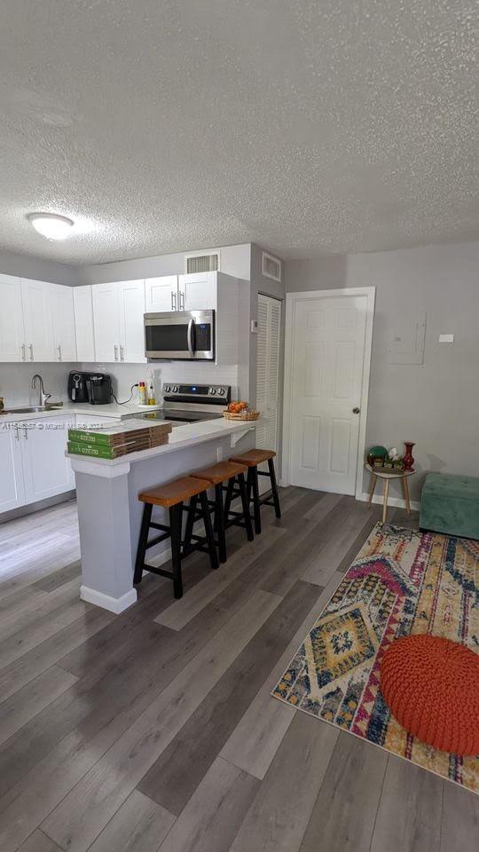 Remodeled 1/1 lakefront condo. Wake up with a beautiful lake view from your bedroom, feels like a house. New stainless steel appliances, freshly painted, laminated floor throughout, large walking closet. The condo features a laundry facility, pool, and tennis court. Excellent location!!! Close to major highways, restaurants, houses of worship, schools, Broward College North Campus, and entertainment. Walking distance to Lakewood shopping, Lemon Tree Lake Park, and public transportation. Show and rent!!! Use attachments to submit an offer along with a photo ID, FULL credit report, and last 3 paystubs. Only COMPLETE offers will be entertained.