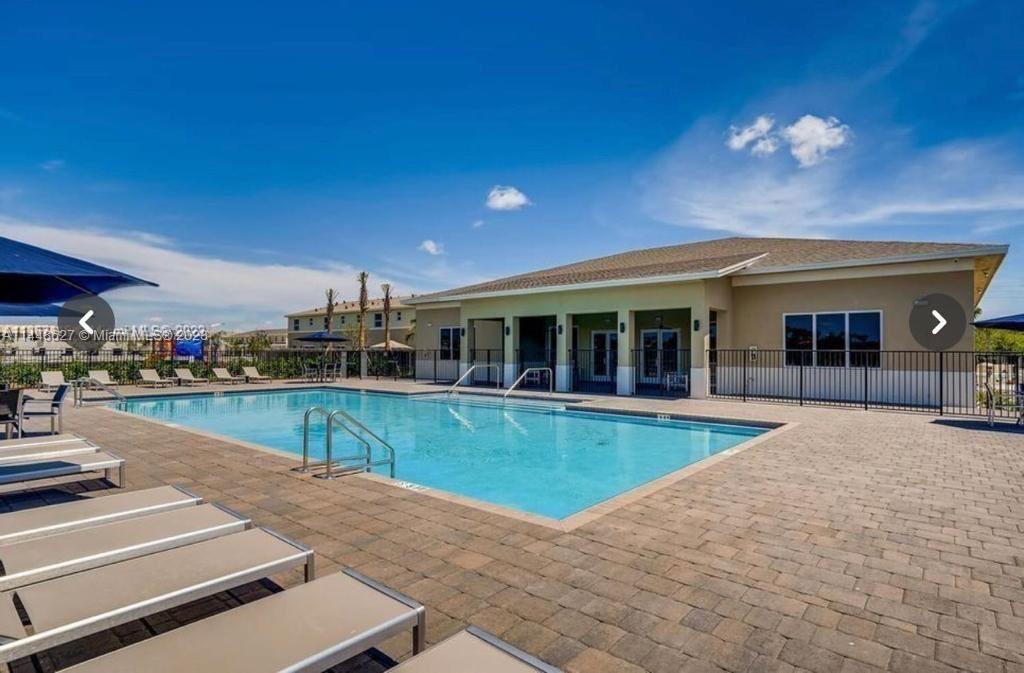 3 beds / 3 full baths in Keys Pointe, one of Miami's newest & most exclusive communities. This rare model, conveniently features a bedroom & full bathroom on the FIRST FLOOR. Beautiful open concept with chef's kitchen featuring custom cabinets & stainless steel appliances and lot with a larger backyard. Completely wired with OPTIC CABLE for maximum high speed internet. Smart Doorbell allows you to view the front door from any smart phone or computer. Washer & dryer included. The luxurious resort style clubhouse features a pool, event/party room, basketball court & a full gym! Located near the Baptist Hospital, Homestead Air Reserve Base & Turkey Point. Easy access to the turnpike. No Association Approval needed. This home is a MUST SEE!