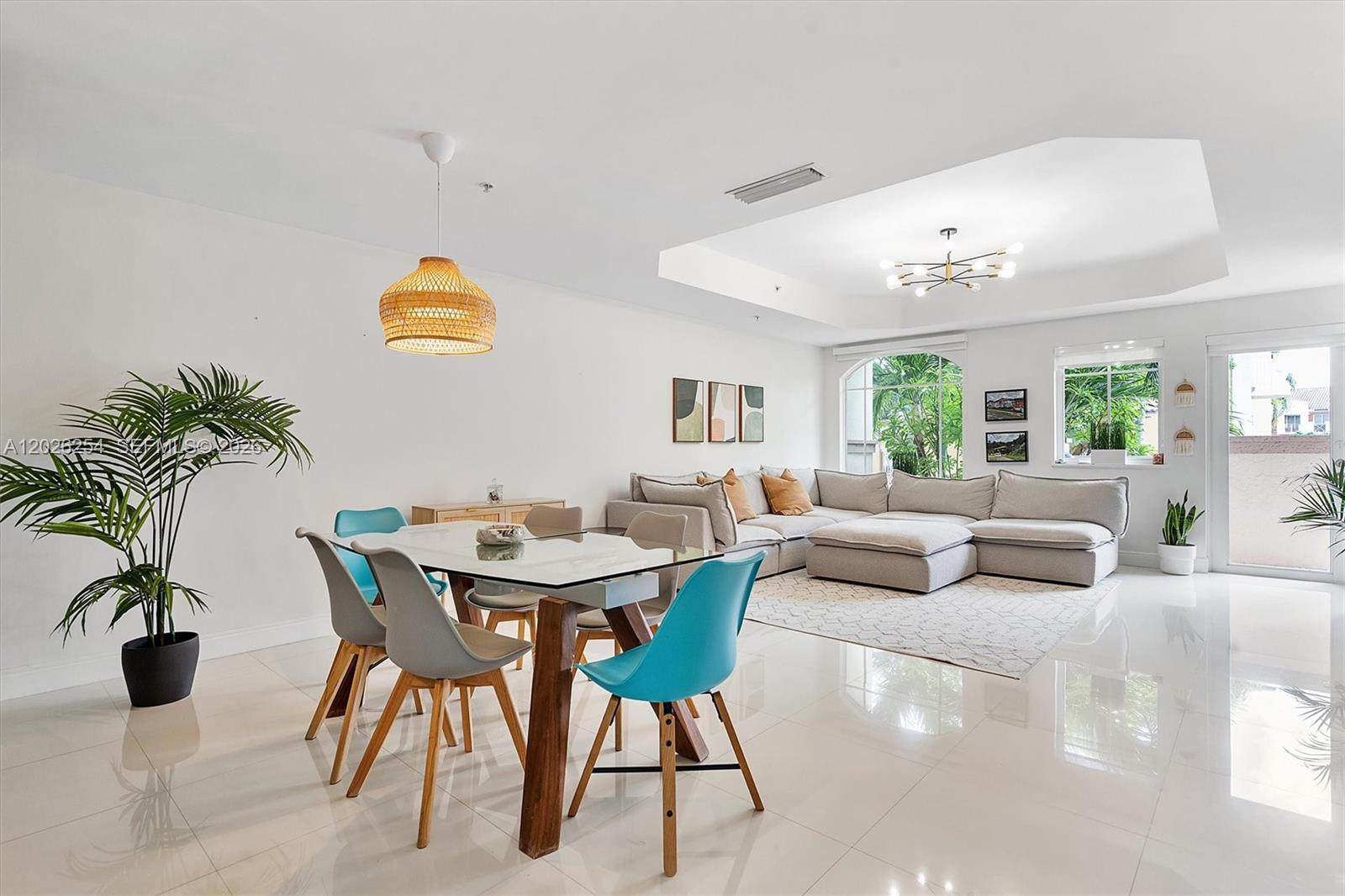 Welcome to this spectacular tri-level townhome in one of Aventura’s most desirable communities! Bathed in natural light and featuring gorgeous bay windows, this beautifully upgraded 3-bedroom, 2.5-bath residence offers the perfect blend of comfort, convenience, and South Florida living.

Nestled in a tropical neighborhood ideal for long walks and outdoor living, residents enjoy resort-style amenities including a sparkling pool, hot tub, fitness center, and community room. Whether you're a first-time homebuyer, relocating to Miami, seeking the perfect second home, or working remotely, this residence offers flexible living in an unbeatable location.

Just minutes from Aventura Mall, parks, dining, schools, the Brightline station, and conveniently located near houses of worship.

An extra room on the first floor offers endless flexibility and would be ideal as a playroom, home office, gym, media room, or even a guest bedroom. Additional highlights include a spacious two-car garage plus ample guest parking for family and visitors. Don’t miss this opportunity to own in the heart of Aventura!
