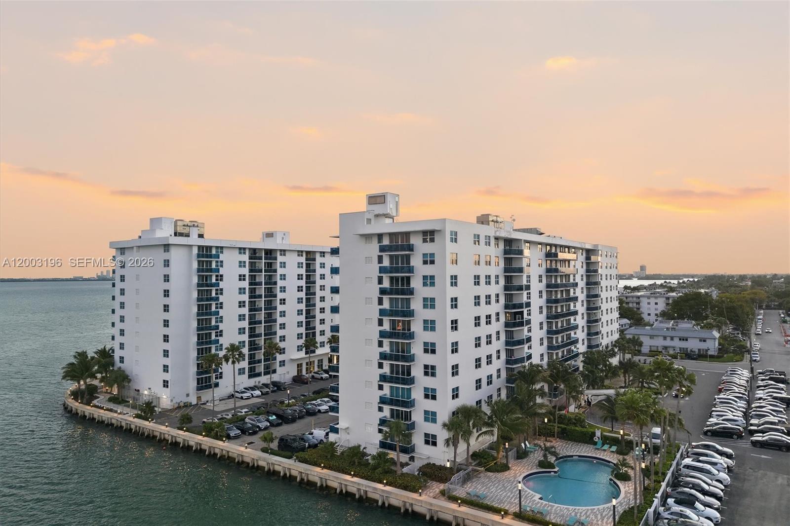 Experience elevated bayfront living in this beautifully updated 3-bedroom, 2-bath residence with stunning Intracoastal views. This light-filled home features a sleek, modern design with an open-concept layout perfect for both everyday living and entertaining. The contemporary kitchen is a standout, complete with stainless steel appliances, ample cabinetry, and a stylish bar/island that seamlessly connects to the living and dining areas.

Clean lines, neutral tones, and thoughtful finishes create a warm yet sophisticated atmosphere throughout. Spacious bedrooms offer comfort and versatility, while large windows invite in natural light and showcase the serene waterfront backdrop.

Located in a desirable waterfront community, residents enjoy convenient access to Miami Beach, Midtown, and Downtown, along with nearby dining, shopping, and major roadways. A perfect blend of style, space, and location—this residence captures the essence of modern coastal living.

Seller to pay the current assessment, and buyer to take over the upcoming second assessment of $5,900.