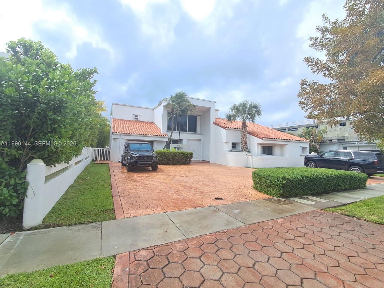 Enjoy exclusive island living on beautiful Biscayne Point.
