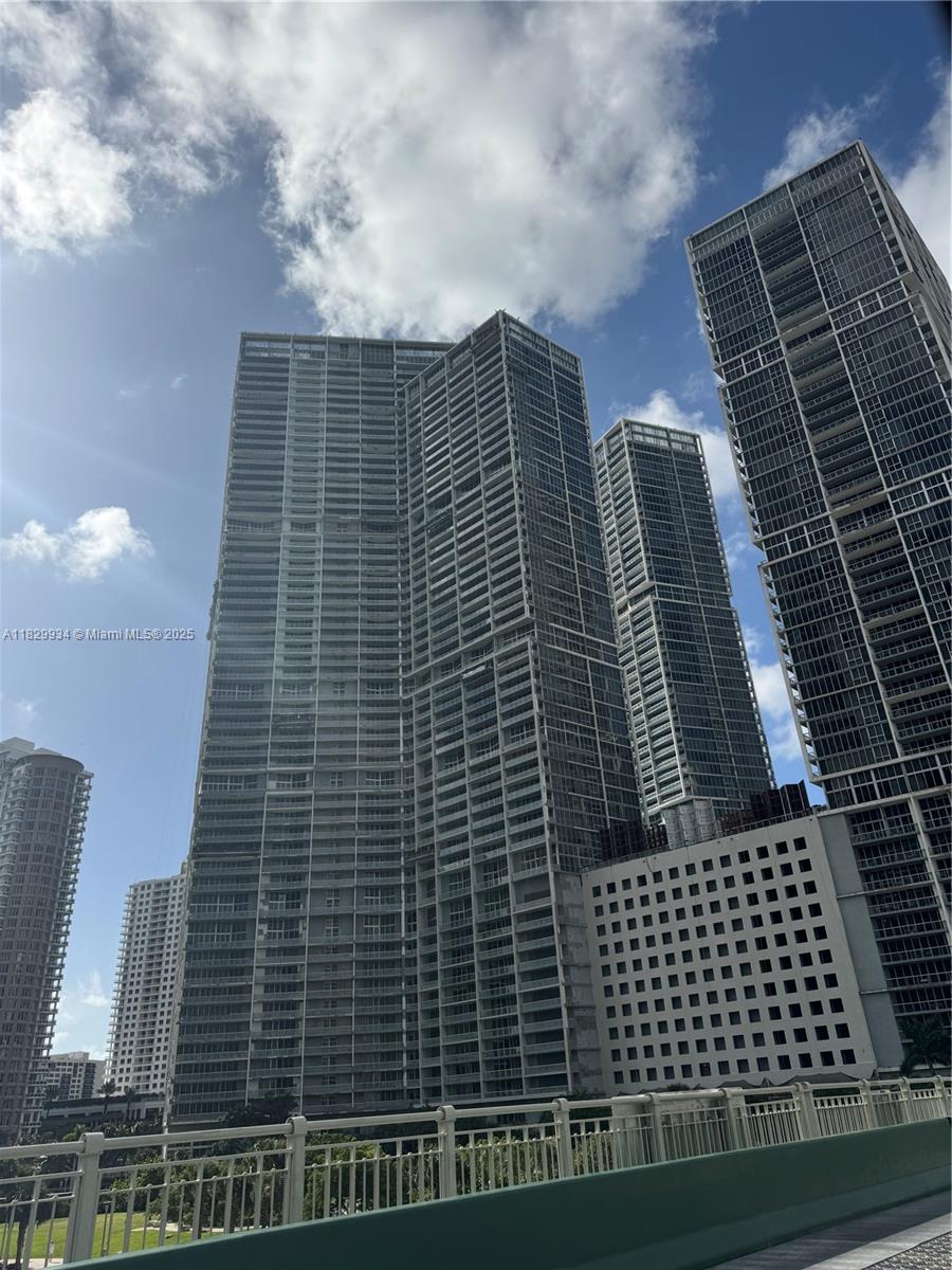 Now offered at $880,000. Discover elevated luxury in Icon Brickell Tower 1, Residence 4207 — a sky-high 1 bedroom + den with breathtaking panoramic views through dramatic floor-to-ceiling glass. This refined residence features an open contemporary layout, premium appliances, and a versatile den perfect for office or guest use. Icon Brickell delivers resort-level living with its legendary pool deck, world-class spa, state-of-the-art fitness center, valet, and 24/7 concierge. Exceptionally positioned at its new price, this home offers unmatched appeal for both end-users and investors seeking prime Brickell living. Easy to show.