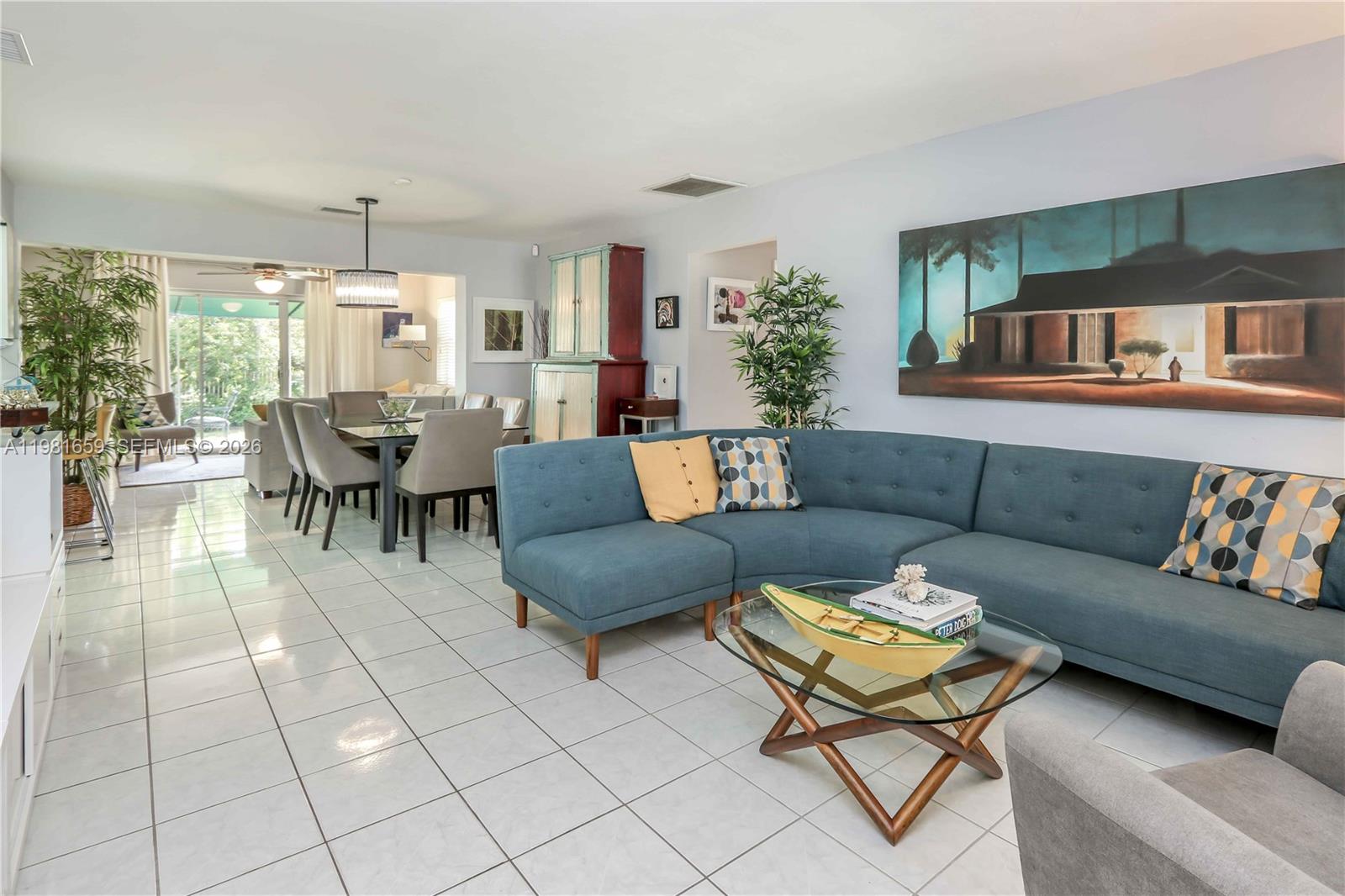 Beautifully situated 3 bed, 2 bath corner lot home East of U.S. Route 1, offering comfort, space, and an ideal location just minutes from the beach. This well-maintained residence features a desirable split floor plan with tile flooring throughout and an abundance of windows that fill the home with natural light.

The spectacular kitchen is the heart of the home, opening seamlessly to the formal dining room, living room, and spacious family room—perfect for everyday living and entertaining.

The spacious primary bedroom includes a walk-in closet, while the third bedroom also features its own walk-in closet and a separate private entrance, creating flexibility for guests, a home office, or extended family. Additional highlights include impact windows, a newer A/C system (2020), and a water heater replaced around 2020 for added peace of mind.

Outside, enjoy a large fenced yard with lush landscaping, a mostly covered driveway, and a covered back patio perfect for relaxing or entertaining. The converted garage adds valuable additional living space.

Ideally located just minutes from the sand and surf at Hollywood North Beach Park, as well as shopping, dining, and everyday conveniences, this home offers the perfect blend of location, space, and lifestyle.