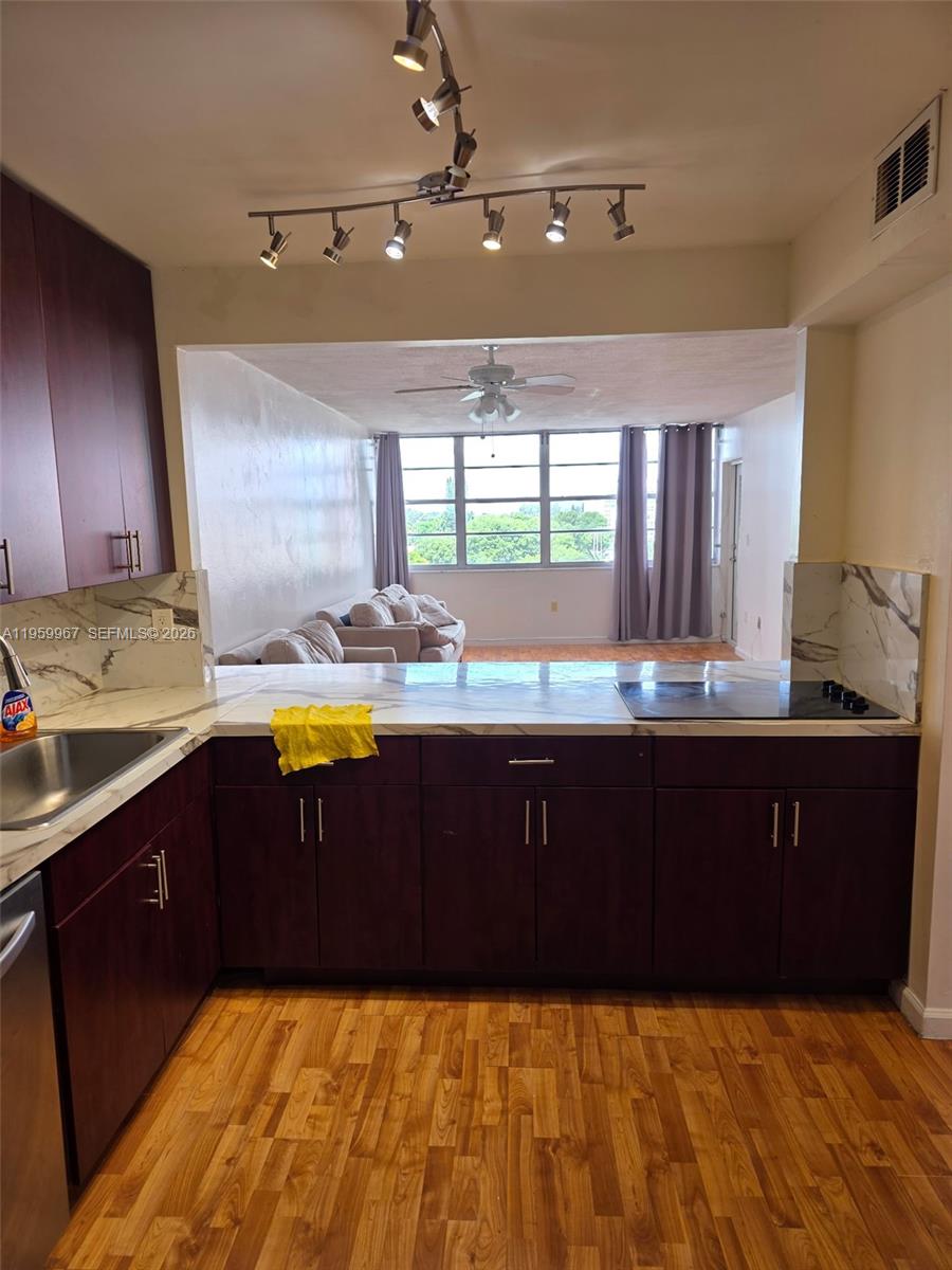 Charming 1/1 Condo with Converted Den & Partial Water View in North Miami Beach. This condo features a versatile, converted den that can serve as an office, guest room, or additional living space. Enjoy stunning partial water views from the comfort of your own home! This well-maintained unit is located in a sought-after North Miami Beach neighborhood, offering a blend of comfort and convenience. The open floor plan is perfect for modern living, with spacious living areas, a cozy kitchen, and natural light throughout. With proximity to shopping, dining, and the beach, this is an excellent opportunity to own a piece of paradise. Don’t miss your chance to make this beautiful condo your own! Easy access to I-95. Short drive to Aventura Mall, dining, shopping, and the beach!
