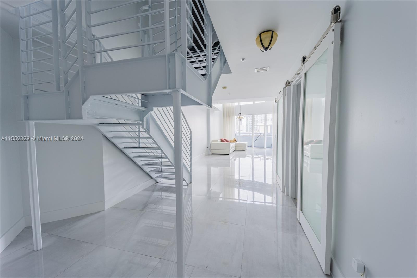 This stunning apartment features double height ceilings, 3 bedrooms and 3 bathrooms. Experience the ultimate in luxury living in the heart of Brickell. With an unbeatable location this property puts you just steps away from the best shopping, dining, and entertainment that the city has to offer. Building amenities include: spacious gym, sauna, steam room, large pool, jacuzzi, valet and party room Pool table, cold plunge, ping pong table and foosball table in the game room. Walking distance to Brickell City Center, Publix, CVS, Wallgreens, Metrorail and I-95. High speed Internet & Cable Included.