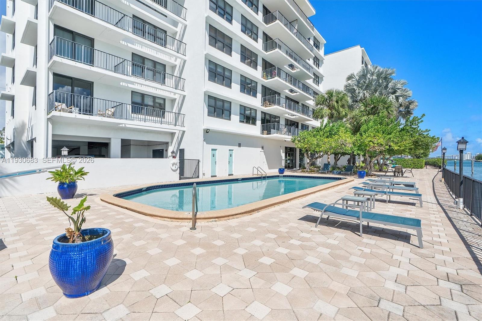 This spacious 2-bedroom, 2-bath condo is located in a beautiful waterfront building in Bay Harbor Islands. Enjoy an open layout, lots of natural light and amazing water views. 1 Assigned parking space plus guest parking, waterfront swimming pool, 24/7 doorman, paddle-board/kayak launch. Walking distance to top-rated schools, restaurants, shops and more.