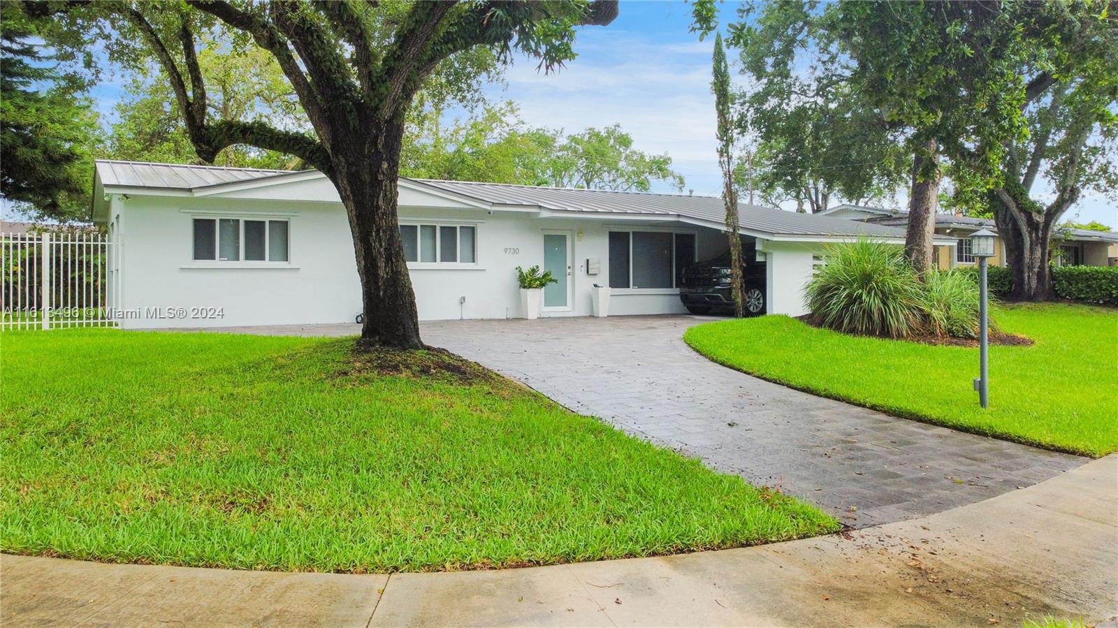 This beautiful single-family residence offers everything you need for comfortable and modern living. With no association fees & recently installed roof, you can enjoy peace of mind and long-term durability. The lush landscaping, maintained by a state-of-the-art sprinkling system, keeps the vibrant plants and fruit trees green and healthy year-round. Located outside of a flood zone, this home provides added security and peace of mind. Additionally, it is equipped with a modern alarm system for enhanced security. The water heater was replaced less than a year ago, and the upgraded air conditioner, complete with new ducts and added insulation, ensures optimal efficiency and comfort. High-quality impact doors enhance safety and energy efficiency. Make this house your home!
