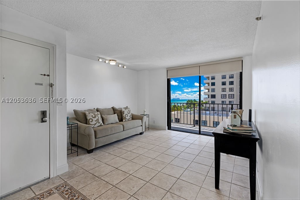 A prime oceanfront residence available at 2625 Collins Ave, Unit 702, located in Miami Beach's desirable Faena District. This spacious 956 sf unit features a functional layout of 1 bedroom and 1.5 bathrooms, freshly painted throughout and enhanced with new custom closet systems, updated appliances, and a tastefully modernized primary bathroom. The unit features hurricane-proof sliding doors and windows for security and peace of mind. The 7th-floor location provides exceptional dual views: direct vistas of the Atlantic Ocean and the sparkling Downtown Miami city skyline. Residents of Oceanfront Plaza enjoy resort-style amenities, including direct beach access, a swimming pool, heated pool, and a dedicated fitness center. The building is positioned in a highly walkable area, just steps from the Miami Beach Boardwalk and world-class dining and entertainment. One assigned parking space is included.