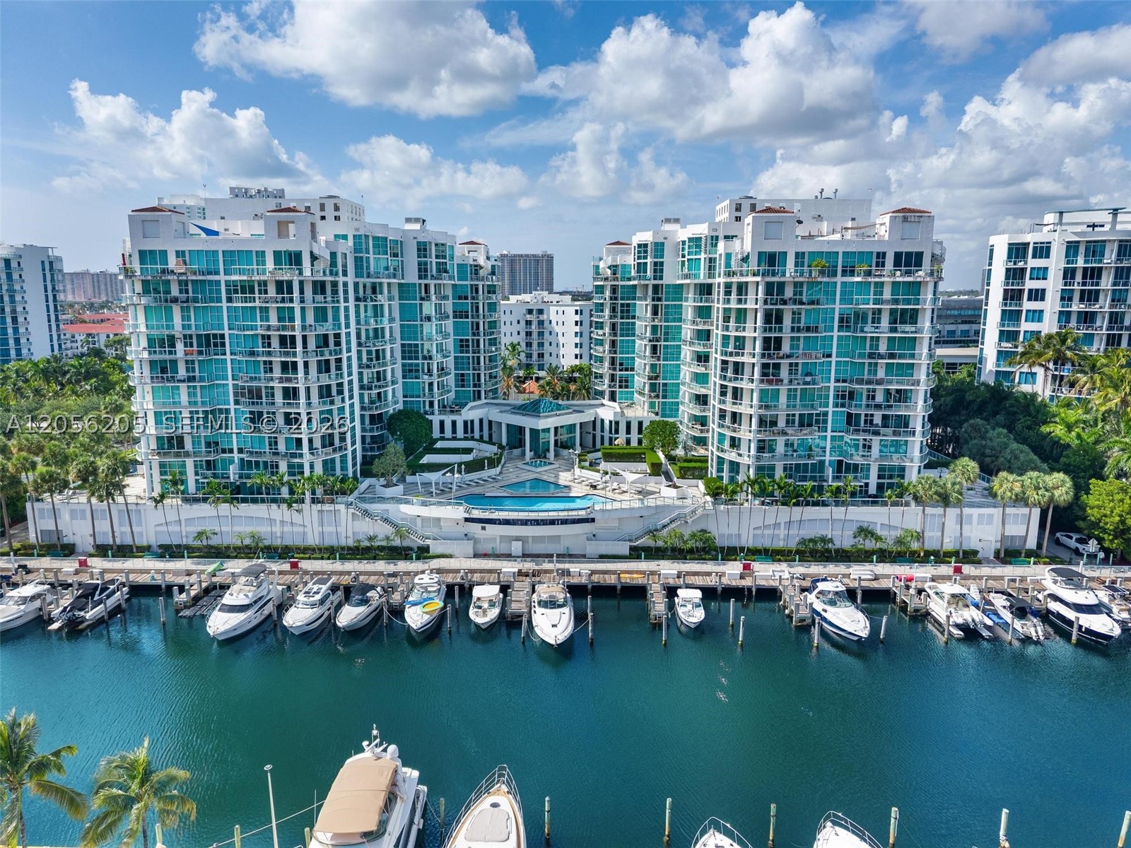 Experience refined waterfront living at Atrium in Aventura. This elegant 2 bed, 2.5 bath residence is framed by floor-to-ceiling glass, filling the interiors with natural light & showcasing sweeping views of the marina, Intracoastal Waterway, & city skyline. The open-concept layout seamlessly connects the kitchen, dining, & living areas, creating an inviting setting for both everyday living & sophisticated entertaining. The kitchen features stainless steel appliances, generous storage, & an effortless flow onto the expansive private balcony—an exceptional space for enjoying sunrise views, evening lights, & the energy of the waterfront. Both bedrooms offer privacy & comfort, while the thoughtfully designed floor plan includes a guest powder room & generously proportioned living spaces. The residence includes one assigned parking space, with the opportunity to purchase a second space separately. Atrium residents enjoy a resort-inspired lifestyle with an infinity-edge pool, hot tub, sun deck, waterfront fitness center, dedicated workspaces, 24-hour security, & a collection of amenities designed for modern living. The property may also qualify for a seller-paid 2-1 interest-rate buydown, offering eligible buyers a rate up to 2% lower during the first year & 1% lower during the second year. The seller pays the full cost of the buydown, providing an opportunity to reduce initial monthly payments while building long-term equity. Subject to lender approval & program terms.