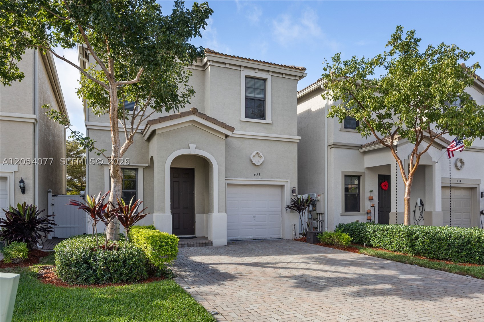 Welcome to this two-story single-family home located in the desirable gated community of Aventura Isles. The
home offers a bright and functional layout with open living and dining areas, abundant natural light, impact
windows, and the added benefit of solar panels, providing energy efficiency and potential utility savings. The
updated kitchen features white cabinetry, granite countertops, stainless steel appliances, and a convenient island
ideal for daily living and entertaining. A half bathroom is conveniently located on the first floor. Upstairs, the home
features a comfortable bedroom layout with well-proportioned rooms and bathrooms, offering privacy and
separation from the main living areas. The second level provides a quiet and functional space designed for rest
and comfort. Enjoy outdoor living in the private fenced backyard with a paved patio, perfect for relaxing or
entertaining. Aventura Isles is a gated, well-maintained community offering great amenities including a
community pool, tennis court, dog park, walking paths, playgrounds, and green spaces. Conveniently located near
major highways, shopping, dining, and with easy access to multiple areas throughout Miami-Dade.