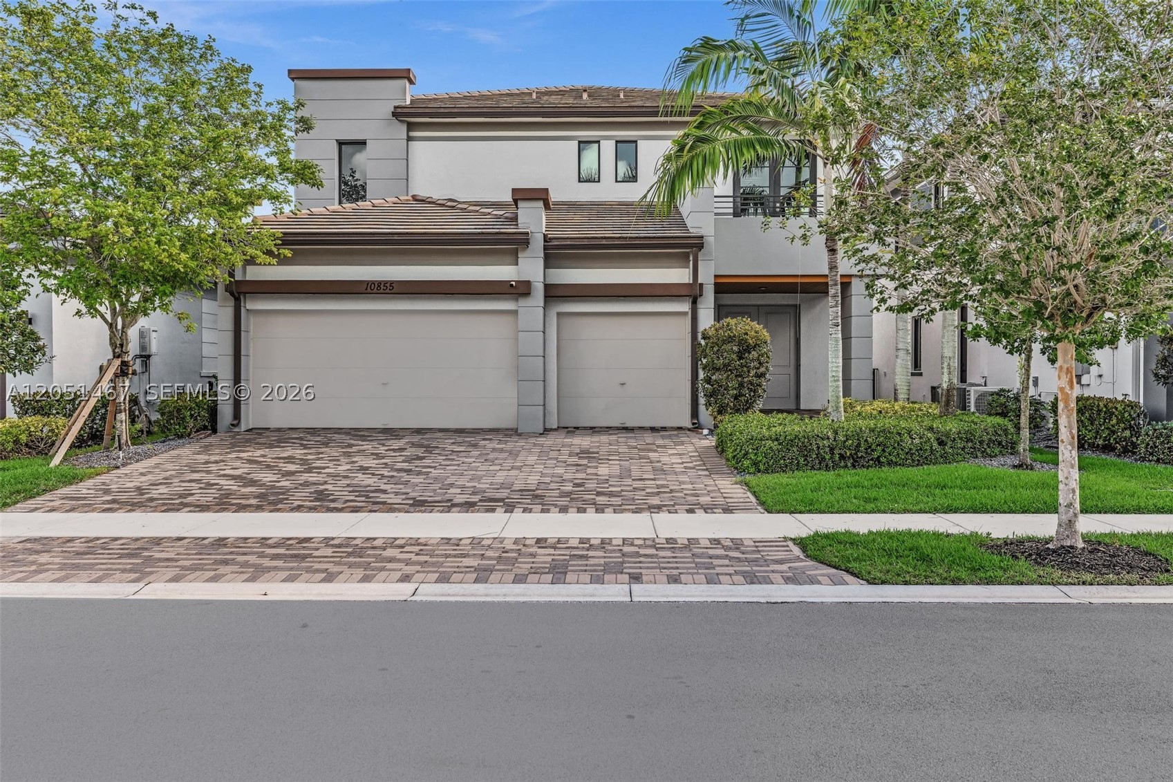 Welcome to this beautiful Piedra model two-story home in the gated community of Cascata in Parkland.  This contemporary residence has 4 bedrooms, 4 bathrooms, a 3-car epoxy flooring garage and a beautiful office behind glass doors. The entire home features high-end finishes with meticulous attention to detail. The oversized primary suite has beautiful water views, an oversized walk-in closet and a stunning bathroom with his/her vanities. The spacious backyard offers plenty of room to design your dream outdoor space or add a custom pool. Retractable electric screens allow the backyard to be used year round in any kind of weather.  
Residents of Cascata enjoy a wonderful lifestyle with resort-style amenities including an Olympic-sized pool, water park for kids, an indoor basketball courts, state-of-the-art fitness center, tennis courts, and soccer fields. Homeowners also have access to the MiraLago community, with an additional resort-style pool, water features, fitness center, and clubhouse and a ballroom available for private events. Cascata and Miralago are known for its lifestyle community and with community activities and popular food truck nights.