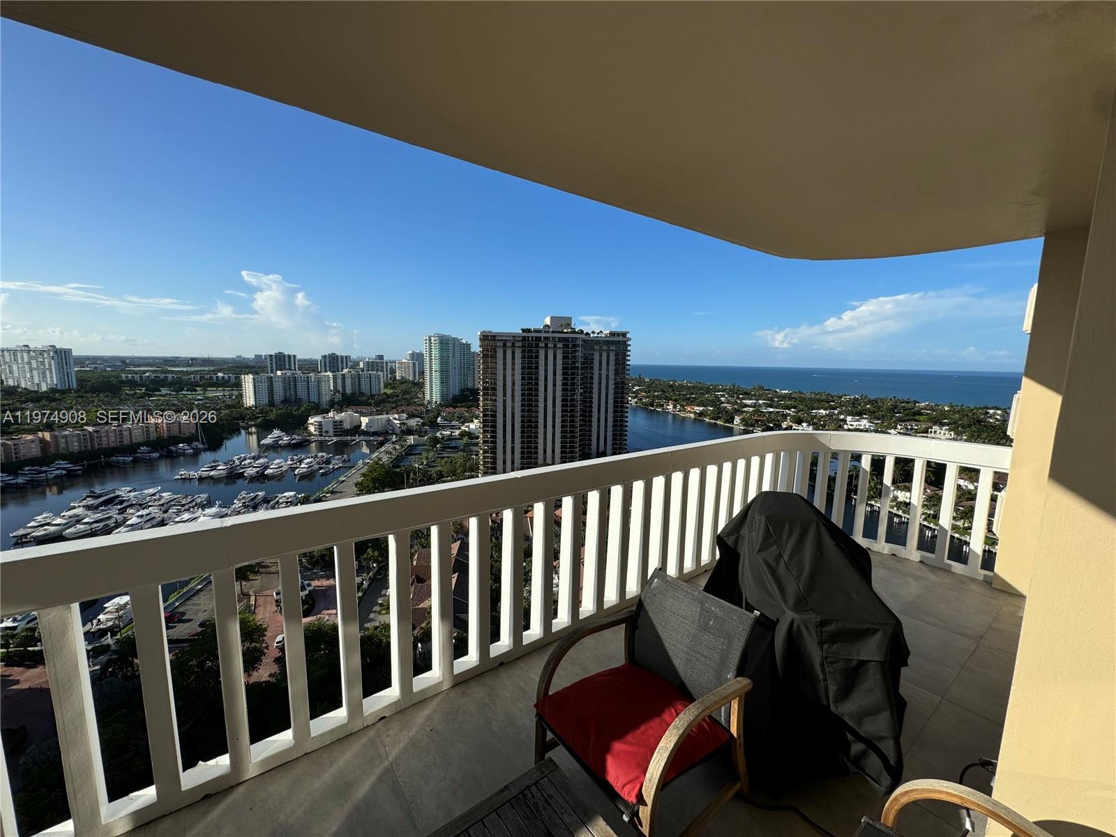 EasyNvest presents this beautifully renovated 1 bed, 1.5 bath condo with stunning city, Intracoastal, and ocean views. Features a new kitchen with KitchenAid appliances, induction cooktop, and spacious marble countertop with cabinets. The bright living space includes a large wall closet with floor-to-ceiling sliding doors in the bedroom. The open-concept bedroom and master bath feature floor-to-ceiling marble and a custom double sink cabinet, plus a guest bathroom. Luxurious 36x36 porcelain tile. The expansive balcony offers stunning views. Includes private storage on the same floor. Building renovations include new glass balconies, pool and deck, and a redesigned lobby entrance. High-speed fiber internet and Breezeline cable provided.