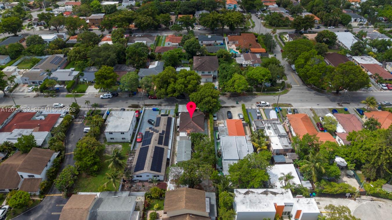 Exceptional investment situated on an oversized 7,750 sq. ft. lot — larger than many comparable properties on the market — this versatile income-producing property offers outstanding flexibility and strong upside potential. Legally a duplex but configured with four separate living units, it is ideal for both end-users seeking to live while generating income and investors looking for redevelopment or long-term value growth. The lot features mature avocado and mango trees, adding rare natural charm and character. Located on a quiet street with nearby new construction, and just minutes from Brickell, Coral Gables, Airport, Coral Way, Calle Ocho, Shenandoah, and Bryan Park. A rare opportunity to acquire a versatile property with strong income potential and future redevelopment possibilities in one of Miami’s most central and rapidly appreciating areas.