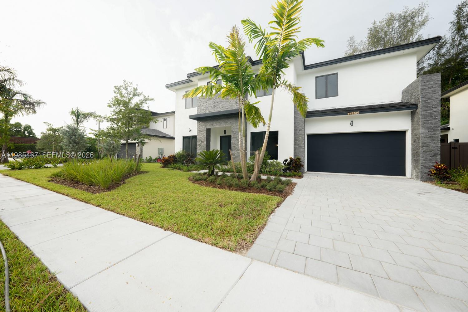 Discover this brand-new construction property at THE OAKS I OF DAVIE , Community of 12 singles families homes 2 car garage, enjoy an open layout w/ample natural light, sophisticated porcelain floor tiles, & impact-resistant doors & windows, this home is perfect for families.Extensive patio with a beautiful pool, 2 story architectural masterpiece is designed with versatility in mind. The expansive floor plan includes a Featuring 5 br & 5 baths, every detail has been thoughtfully designed for family living and entertaining. The spacious living area flows seamlessly into the grand kitchen, breakfast nook, and formal dining room, kitchen is equipped with stainless steel appliances, quartz countertops and abundant cabinet space. !!!!!!!!!! WILL BE READY THIS SUMMER 2026 !!!!!
For showings call the listing agent !!!!