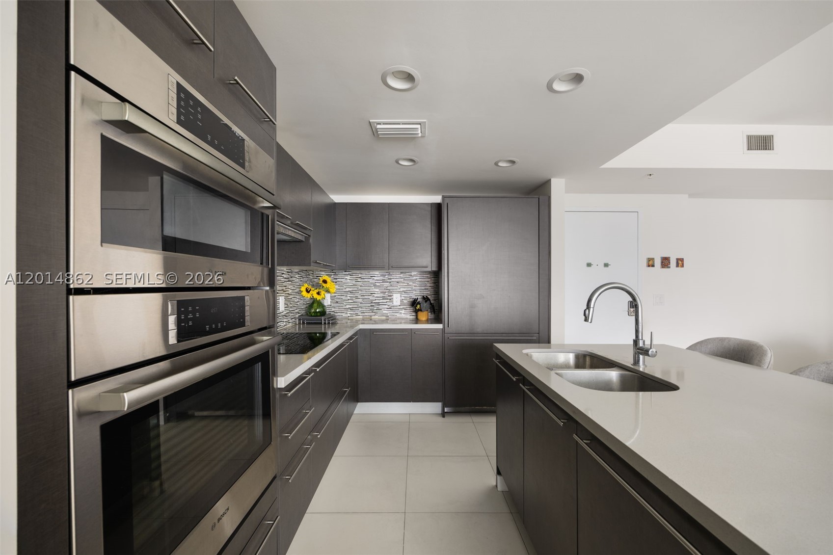 Beautiful 2-bedroom, 2-bath residence located on the 4th floor in the highly desirable Midtown Doral community. Featuring 1,130 SqFt of living space with elegant oversized porcelain floors throughout, this unit offers a modern and sophisticated design in one of Doral’s most convenient locations. Includes two covered parking spaces.
Perfect for families thanks to its proximity to top-rated A+ schools, while also representing an excellent investment opportunity with strong rental demand. Residents enjoy access to the exclusive Century Midtown Club Spa & Fitness Center, included with the community amenities, featuring a fully equipped fitness center, resort-style pool, spa, lounge areas, and recreational spaces.
Additionally, all four residential towers offer commercial spaces on the ground level, creating a true walkable lifestyle with restaurants, cafés, bakery, mini market, fitness studios, pilates, dental office, hair salon, ice cream shop, and many other convenient services just steps away.
The association is exceptionally organized and maintains the building in pristine condition, with personalized lobby/front desk attention 7 days a week. 
Conveniently located near Publix, CVS, and with immediate access to the Turnpike for quick connectivity throughout Miami. Ideal for both end-users and investors seeking location, lifestyle, and convenience.