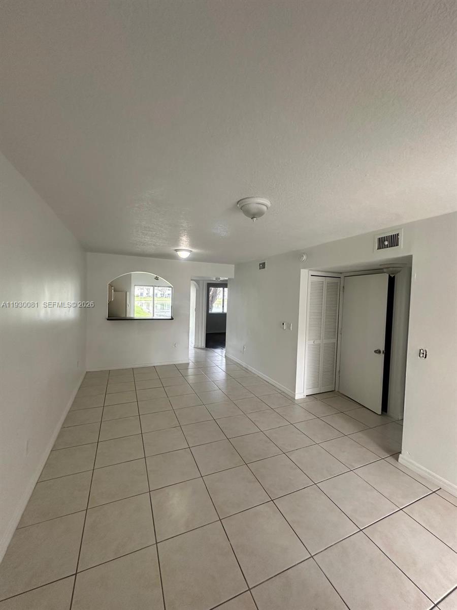 Nice 2-bedroom, 2-bath condo in Venetia Gardens South. First-floor unit with tile flooring and open living area. Gated community with pool and common areas. Close to shopping, highways, and schools. Fast approval. Easy to show. Only First and Deposit !!