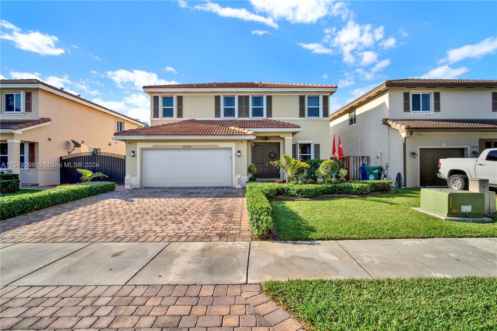 NO HOA! The perfect family home awaits you. This massive 4 bedroom 2 1/2 bath home has everything you need for the whole family. And is located in a pristine neighborhood close to Air Base K-8 Center, one of South Florida top rated schools. This home has a large two car garage, family room, living room, and dining room. The Laundry room is conveniently located upstairs close to all bedrooms. The screened in covered patio allows you to enjoy  the Florida weather without the pesky mosquitoes. There is a lot to come see at this flawless home, large AC unit from 2018, accordion shutters on all windows and sliding doors, no carpet anywhere, large tankless water heater, generator ready, sprinkler system, fruit trees, and so much more! Come see it at the open house this Saturday 10:30-3:30pm