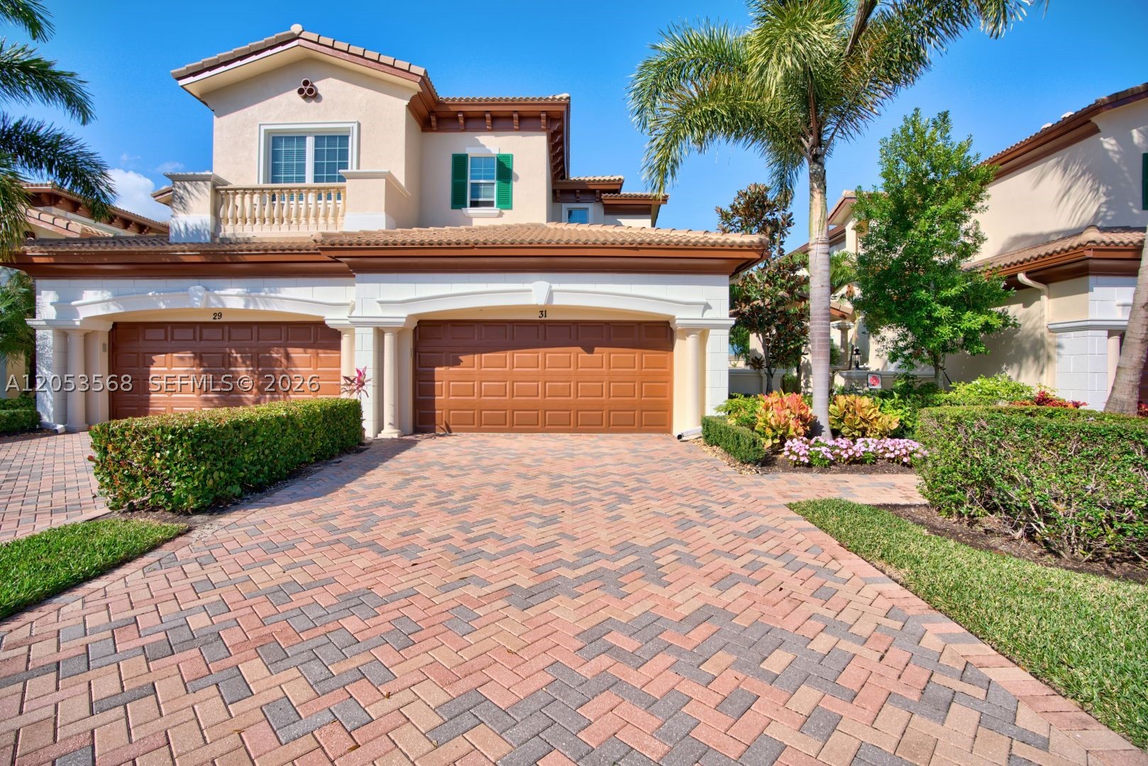 Experience resort-style living at its absolute finest in this well maintained 3-bedroom, 3-bathroom townhome located within the prestigious gated community of Jupiter Country Club. Spanning 2,665 square feet of bright, open-concept space, this premium unit features an elegant layout with tile flooring, a separate formal dining room, a modern pantry, and a private elevator, all leading out to a spacious screened balcony with peaceful, panoramic water views. Renting this home unlocks an unparalleled country club lifestyle, granting you seamless access to world-class community amenities including a state-of-the-art fitness center and gym, multiple sparkling resort-style swimming pools, tennis and pickleball courts, and a grand Tuscan-style clubhouse with on-site dining.