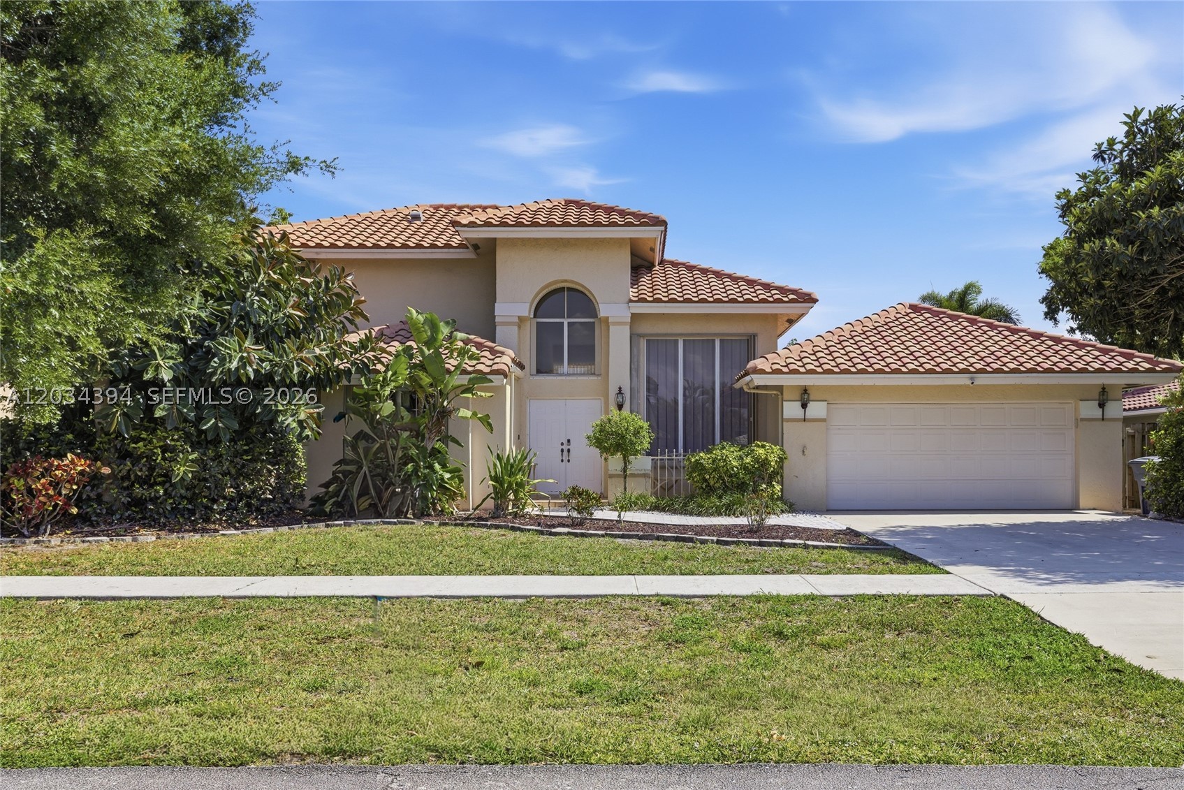 IMMACULATE, MOVE IN READY HOME! GREAT PEACEFUL LOCATION, NEW TILE ROOF IN 2014, FENCED IN YARD. MASTER AND 2ND BEDROOM ON GROUND FLOOR, 2 BEDROOMS AND FULL BATH UPSTAIRS. POOL SPA HOME OPEN AND AIRY. KITCHEN HAS QUARTZ COUNTER TOP WITH STAINLESS APPLIANCES. LOWER LEVEL HAS ALL PORCELAIN TILES. MASTER WITH HUGE DOUBLE SHOWER. GREAT SCREENED-IN POOL DECK. SEPARATE LAUNDRY ROOM AREA IN GARAGE. HIGH CEILINGS, SPLIT BEDROOMS. BOCA BAY IS A QUIET COMMUNITY LOCATION WITH VERY WELL KEPT HOMES. NEAR A-RATED SCHOOLS, LIBRARY, SHOPPING, RESTAURANTS AND 5 SUPERMARKETS NEAR BY. CLOSE TO TURNPIKE AND TOWN CENTER MALL. MOVE IN CONDITION! MUST SEE! ALL AGES WELCOME. NO TRUCKS OR RV'S.