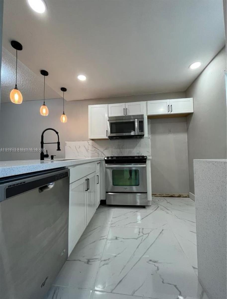 ELDERBERRY GARDENS CONDO - Residential