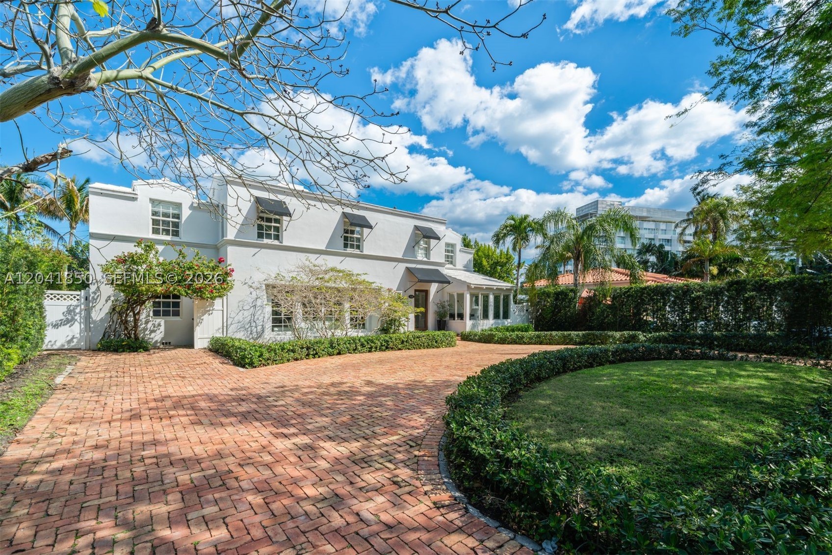 Completely renovated and ideally located in Miami Beach’s coveted Nautilus neighborhood, this stunning home offers 4 bedrooms, 4.5 bathrooms, and an airy open floor plan that seamlessly blends original architectural charm with modern design. Sun-drenched living spaces feature European oak floors, a chef’s kitchen with professional-grade appliances and marble backsplash, and expansive indoor-outdoor flow. The backyard is a private oasis with a saltwater pool, full outdoor kitchen, and a two-story pool/guest house with a separate entrance.