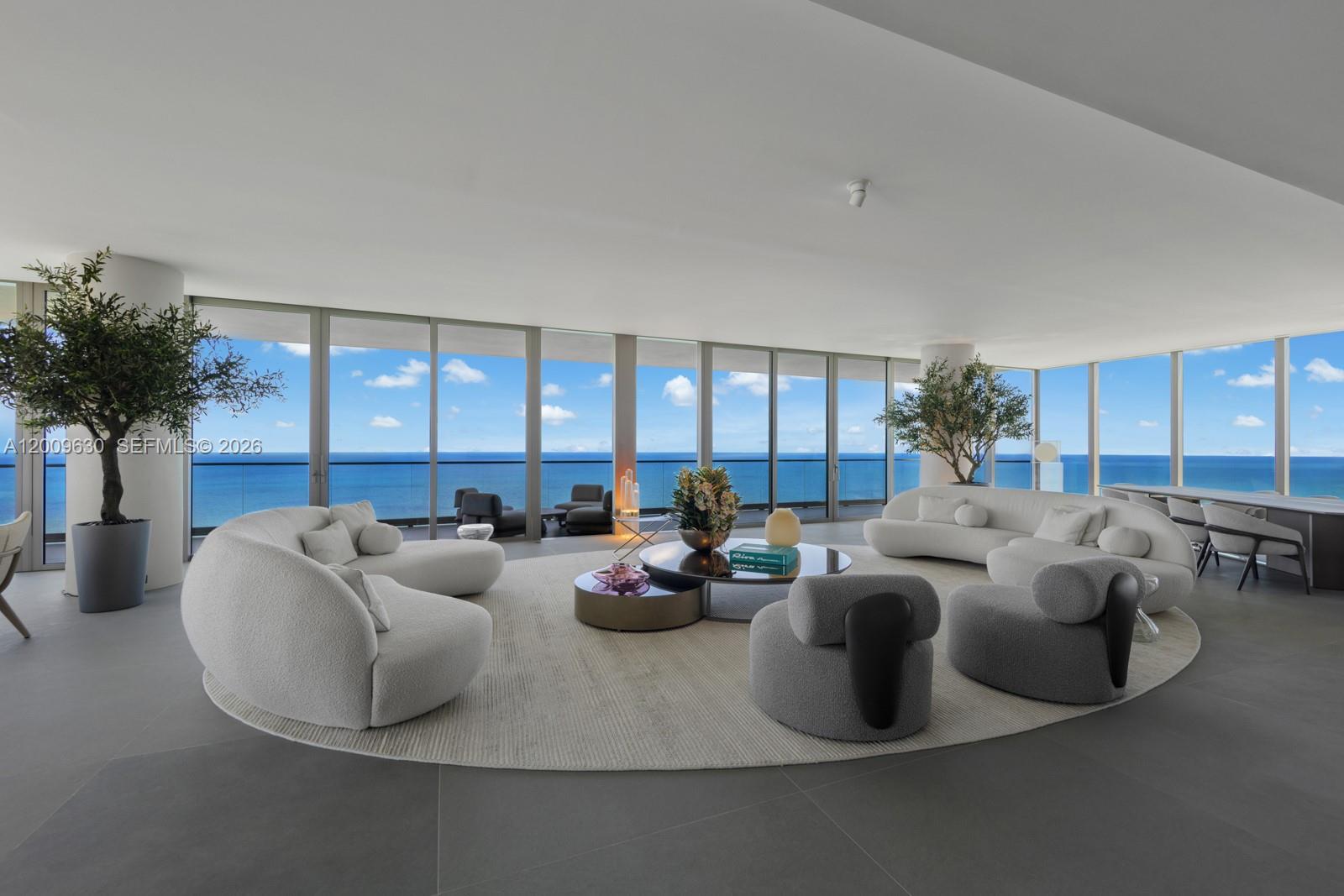 Step into a breathtaking full-floor penthouse designed by Enrique Norten, where nearly 6,000 square feet of never-lived-in luxury awaits. Artefacto-curated interiors showcase five bedrooms plus staff quarters, six and a half bathrooms, Minotti kitchen, Gaggenau appliances, and refined B&B Italia bathrooms. Two expansive terraces frame sweeping ocean and sunset views from this home in the sky. Resort-caliber amenities include sunrise and sunset pools, full-service beach, spa, and Minotti-designed lounges. Minutes from Shell Bay Club, Aventura Mall, and Bal Harbour Shops, this is brand-new oceanfront sophistication at truly remarkable value.